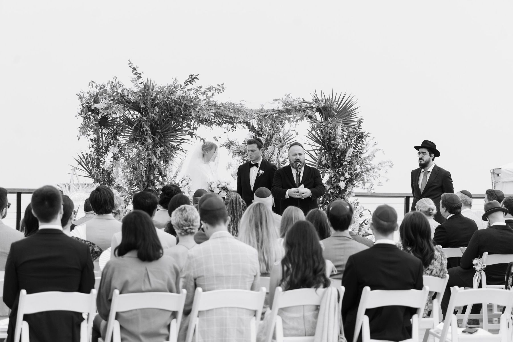 Beach Chic Vows: Ally and Dylan's Serene Gurney's Montauk Wedding photo