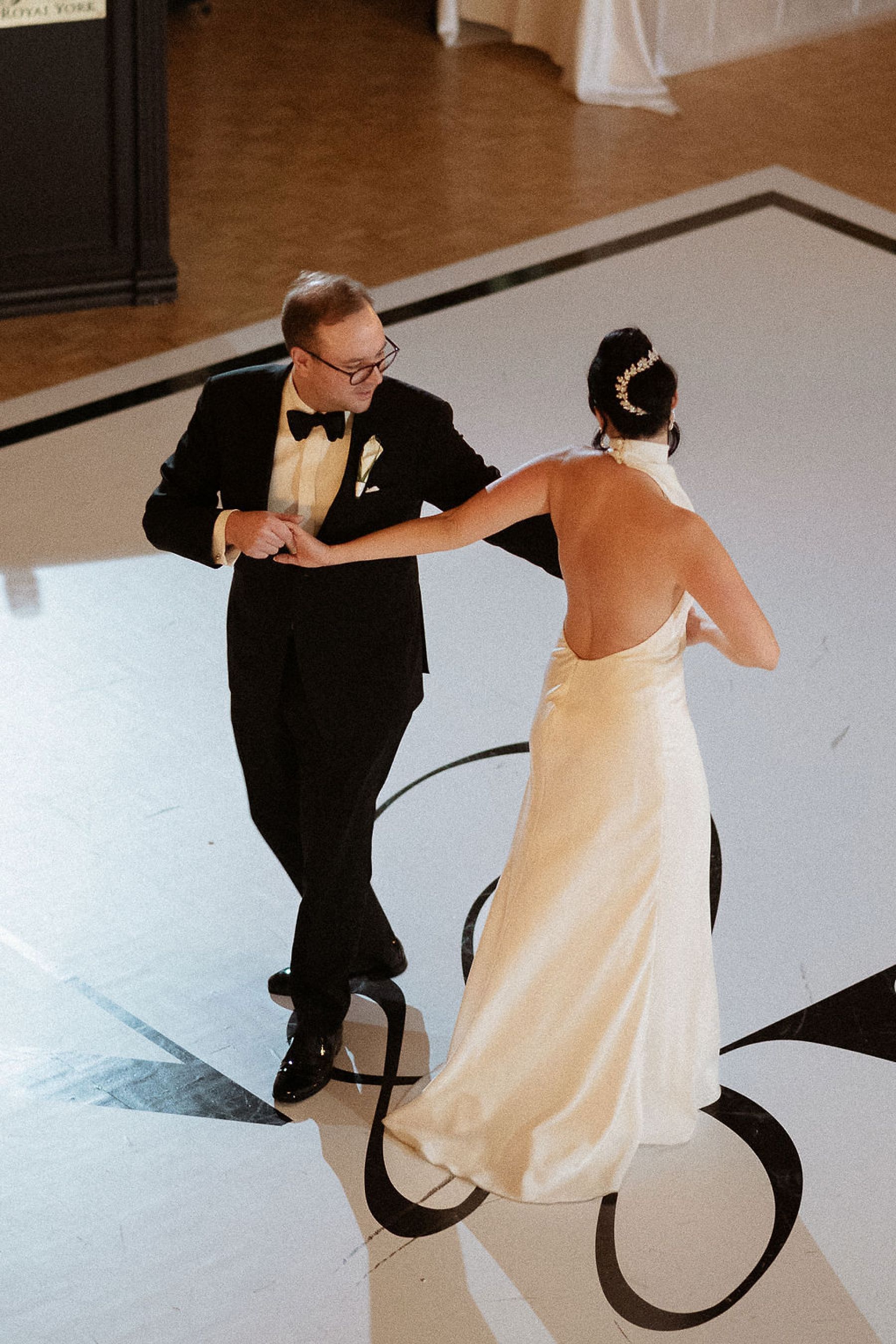 Candlelight, Calla Lilies, and Classic Charm: Nicolette and Victor's Exquisite Nuptials at the Fairmont Royal York Hotel photo