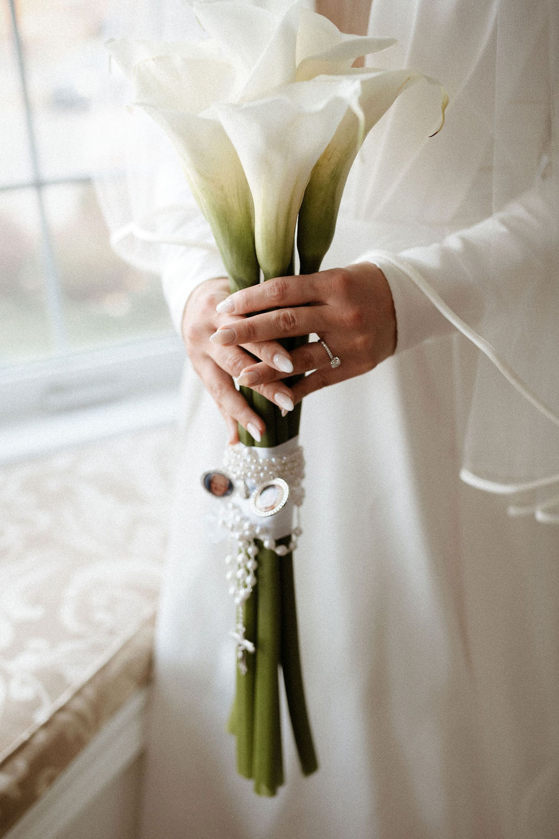 Candlelight, Calla Lilies, and Classic Charm: Nicolette and Victor's Exquisite Nuptials at the Fairmont Royal York Hotel photo