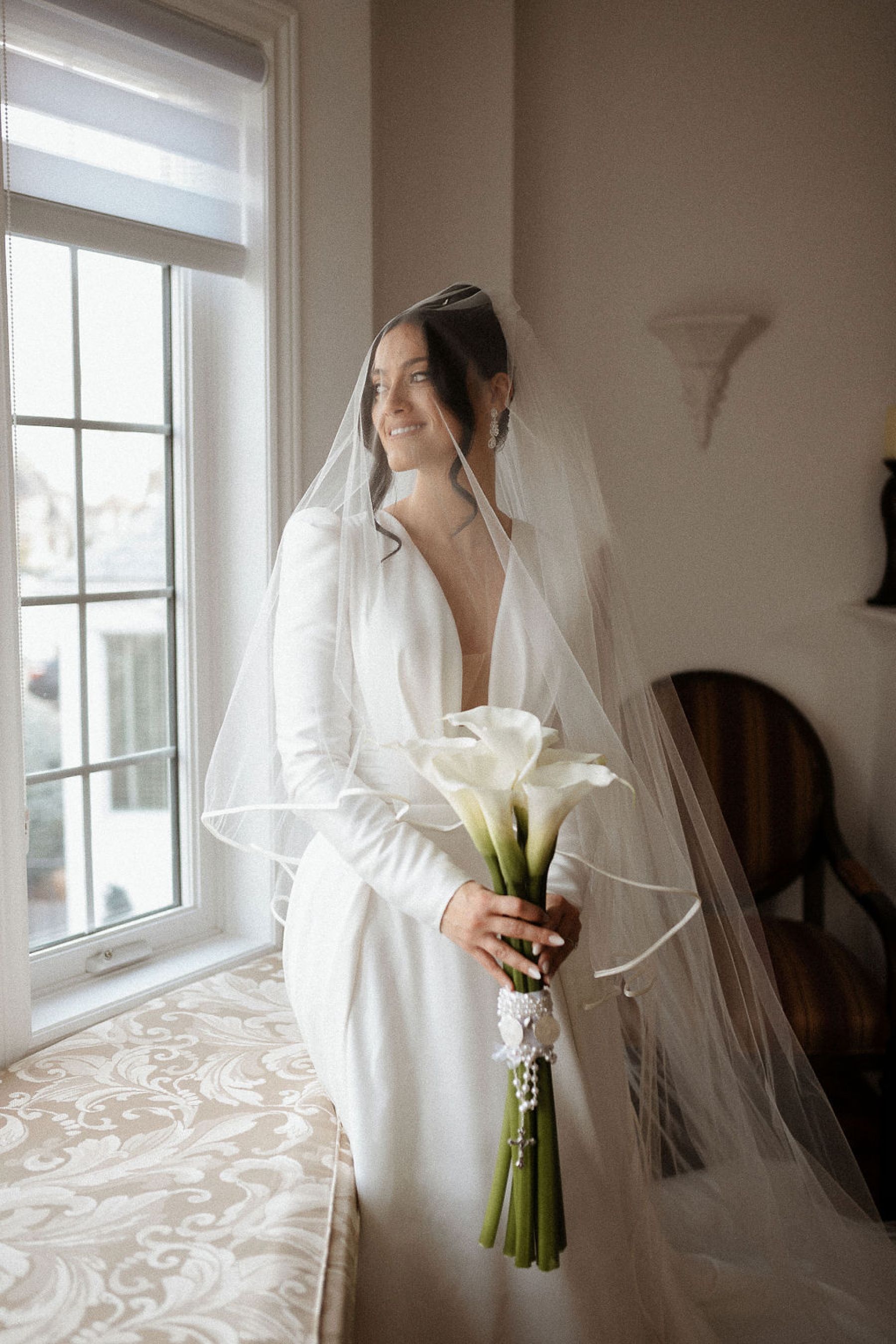Candlelight, Calla Lilies, and Classic Charm: Nicolette and Victor's Exquisite Nuptials at the Fairmont Royal York Hotel photo