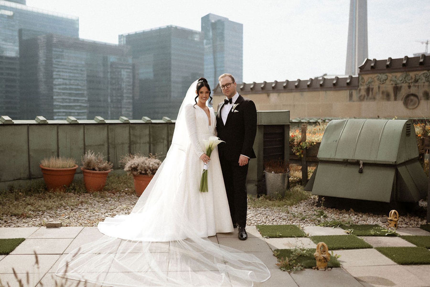 Candlelight, Calla Lilies, and Classic Charm: Nicolette and Victor's Exquisite Nuptials at the Fairmont Royal York Hotel photo