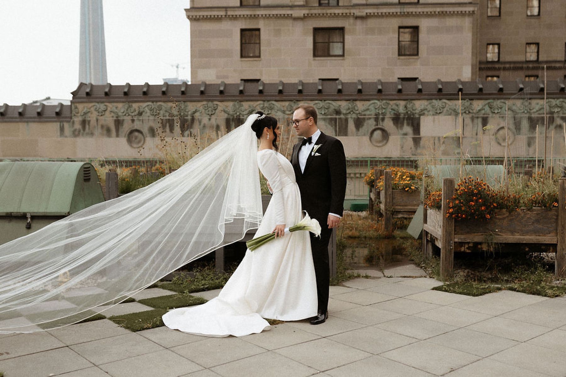 Candlelight, Calla Lilies, and Classic Charm: Nicolette and Victor's Exquisite Nuptials at the Fairmont Royal York Hotel photo