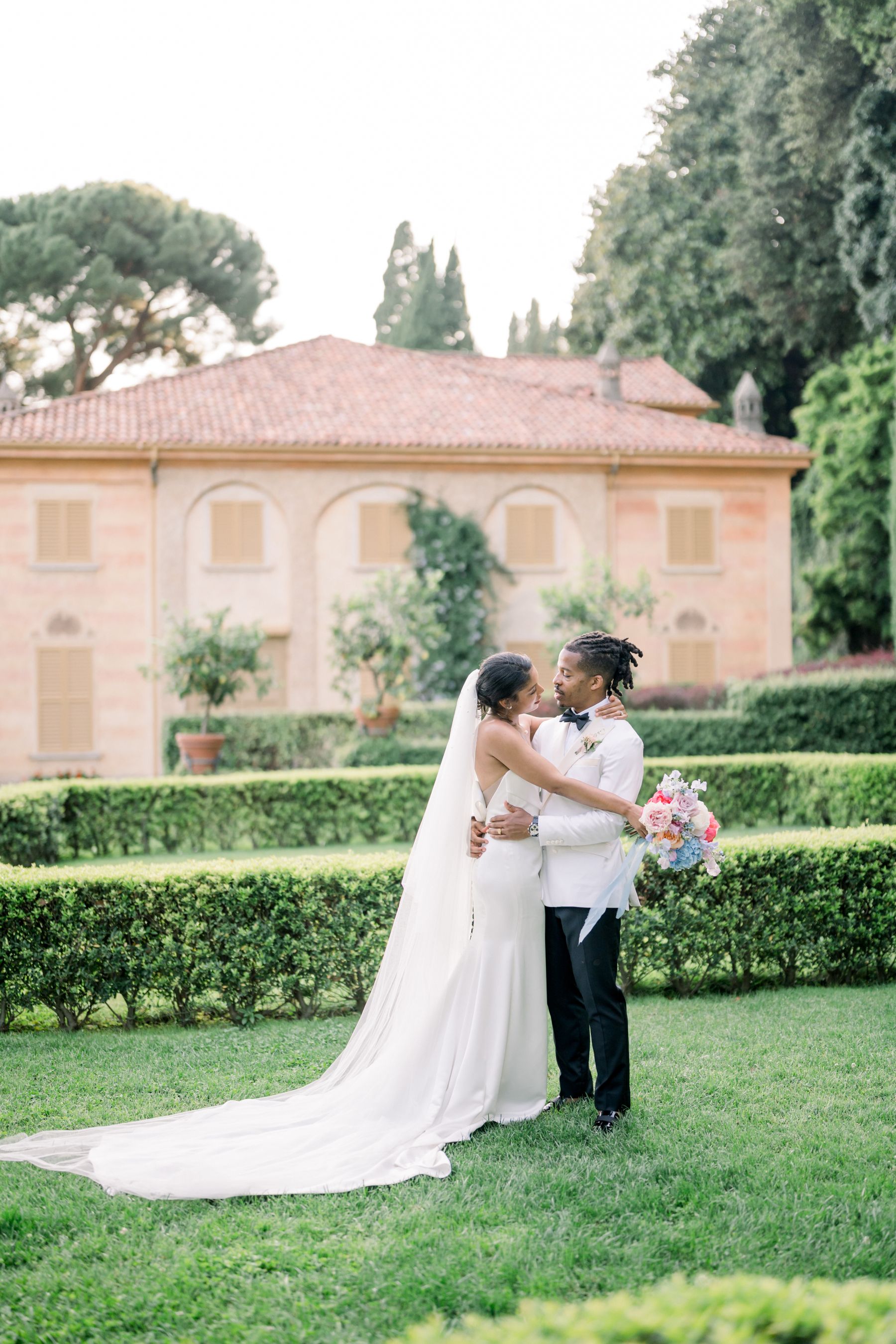 Rainbows After the Rain: Jasmine and Kristopher's Joyful Union at Villa Pizzo photo