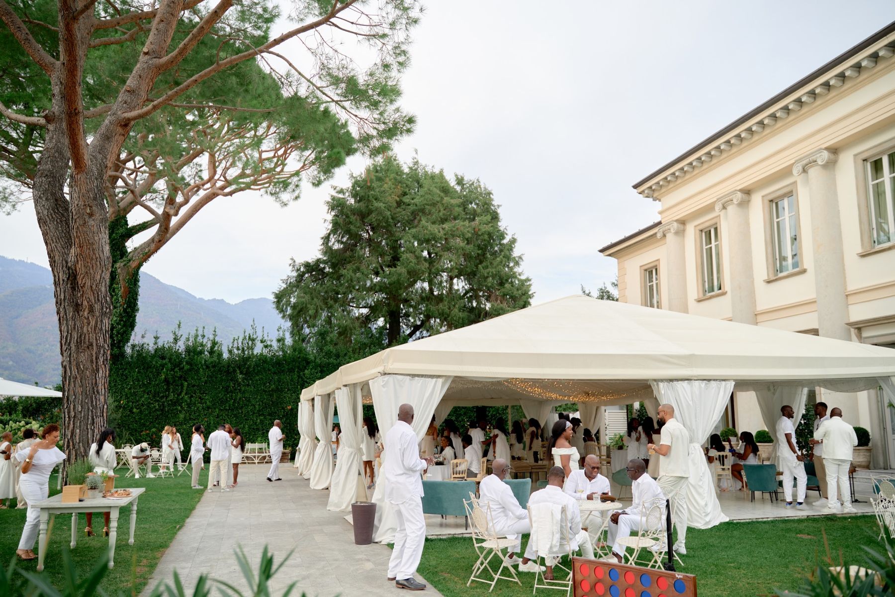 Blossoming Love by the Lake: Sade and Afam's Dreamy Celebration at Villa Erba and Villa Gastel photo