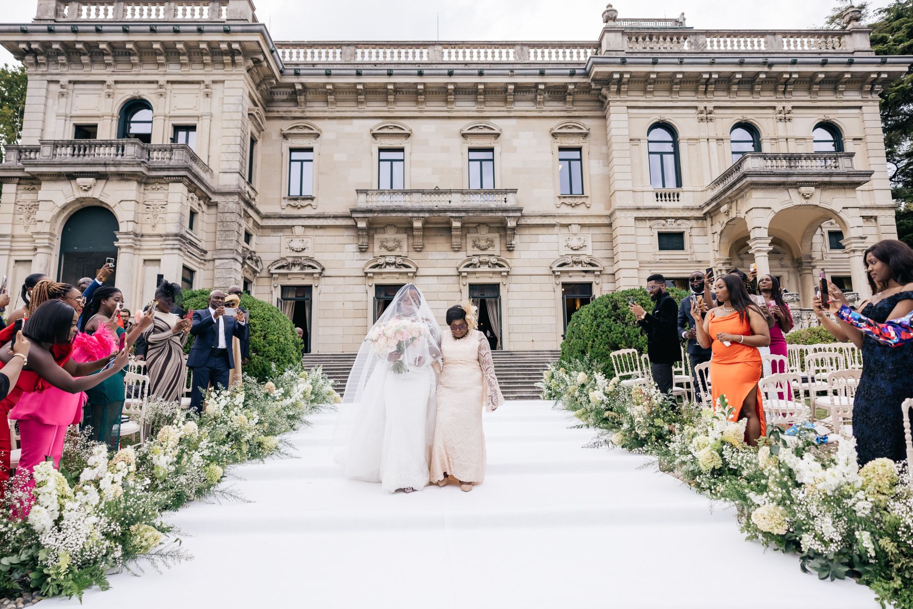 Blossoming Love by the Lake: Sade and Afam's Dreamy Celebration at Villa Erba and Villa Gastel photo