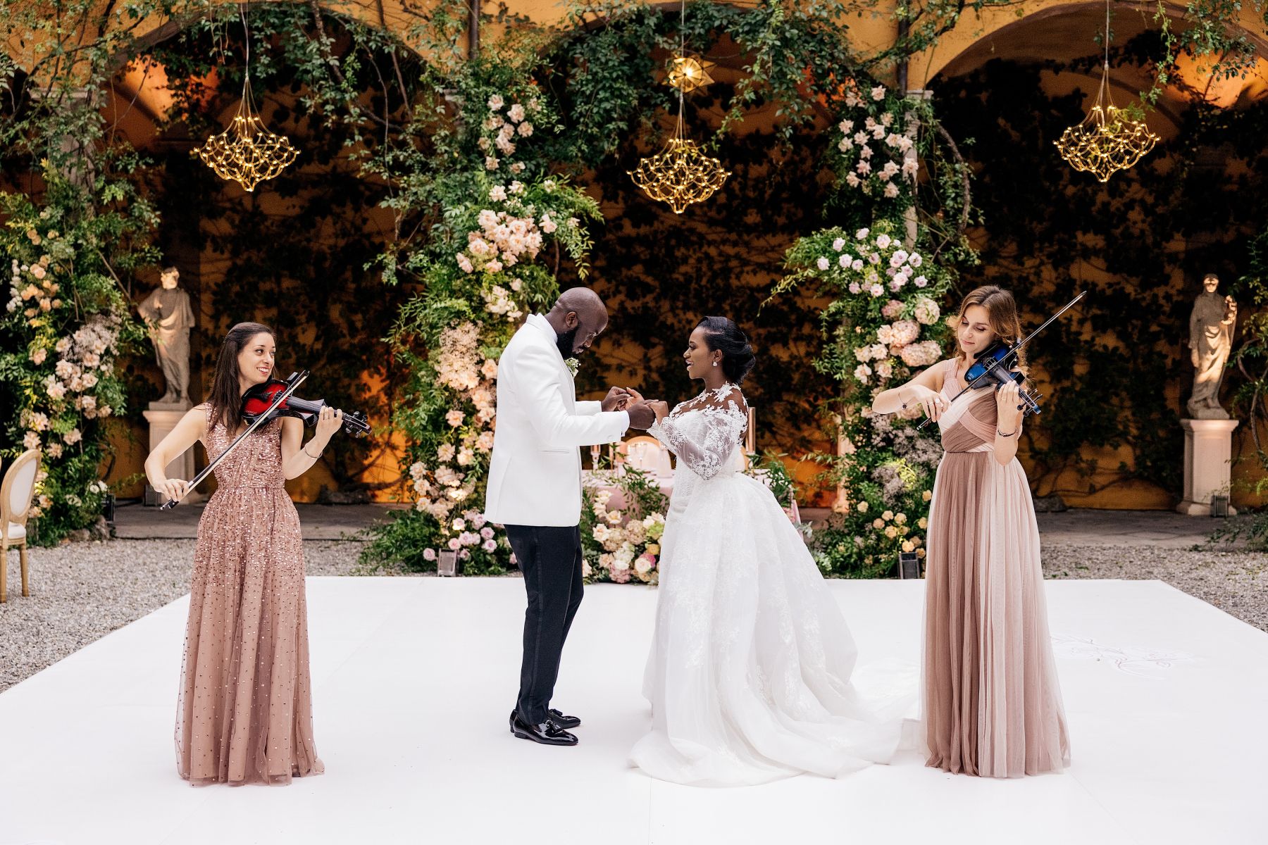 Blossoming Love by the Lake: Sade and Afam's Dreamy Celebration at Villa Erba and Villa Gastel photo
