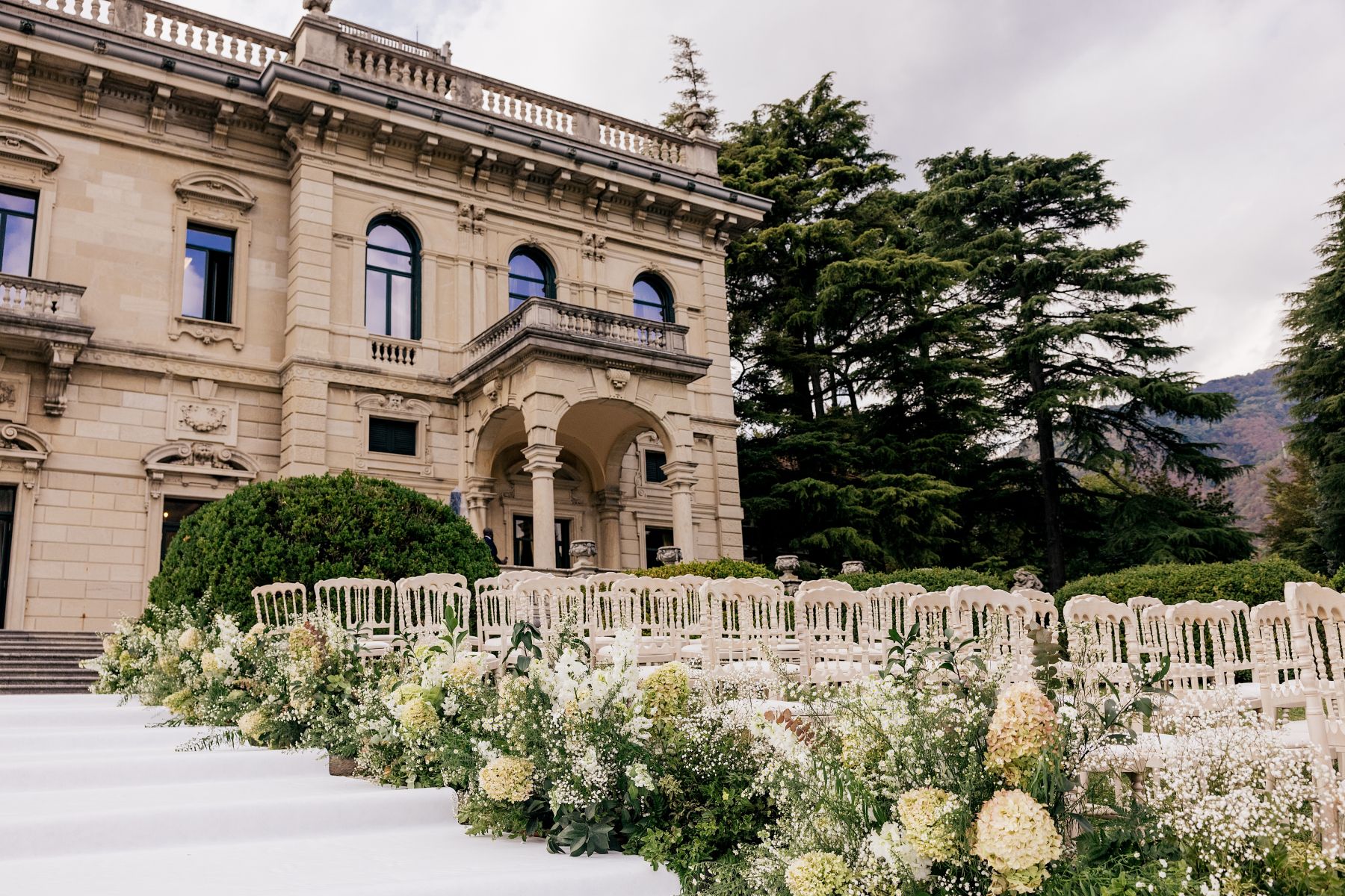 Blossoming Love by the Lake: Sade and Afam's Dreamy Celebration at Villa Erba and Villa Gastel photo
