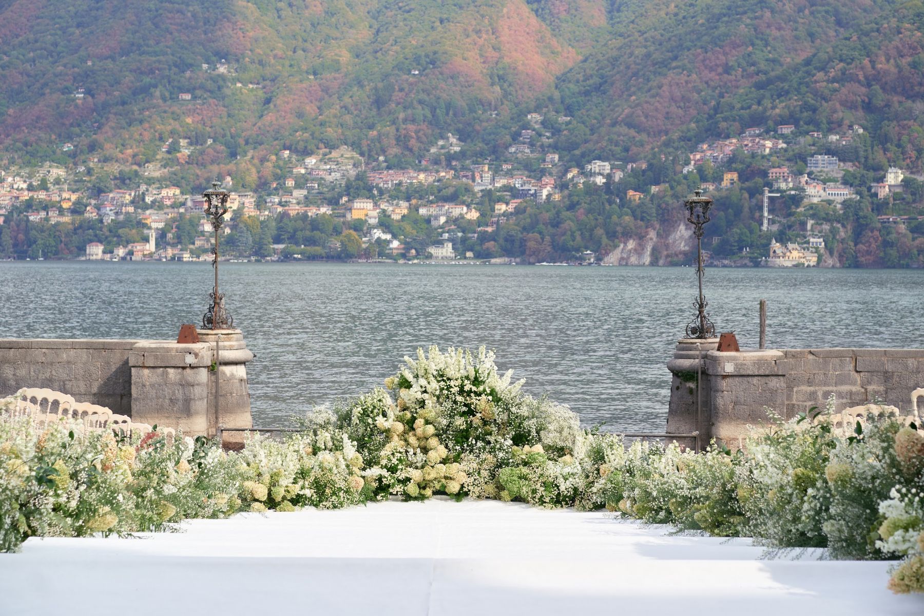 Blossoming Love by the Lake: Sade and Afam's Dreamy Celebration at Villa Erba and Villa Gastel photo
