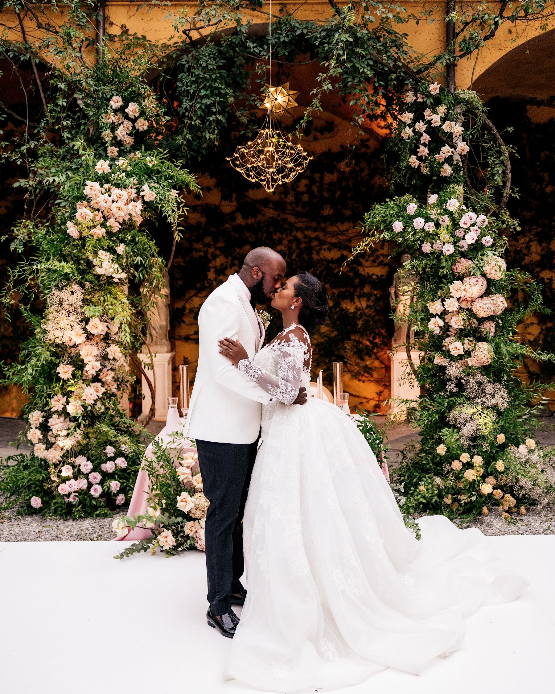Blossoming Love by the Lake: Sade and Afam's Dreamy Celebration at Villa Erba and Villa Gastel photo