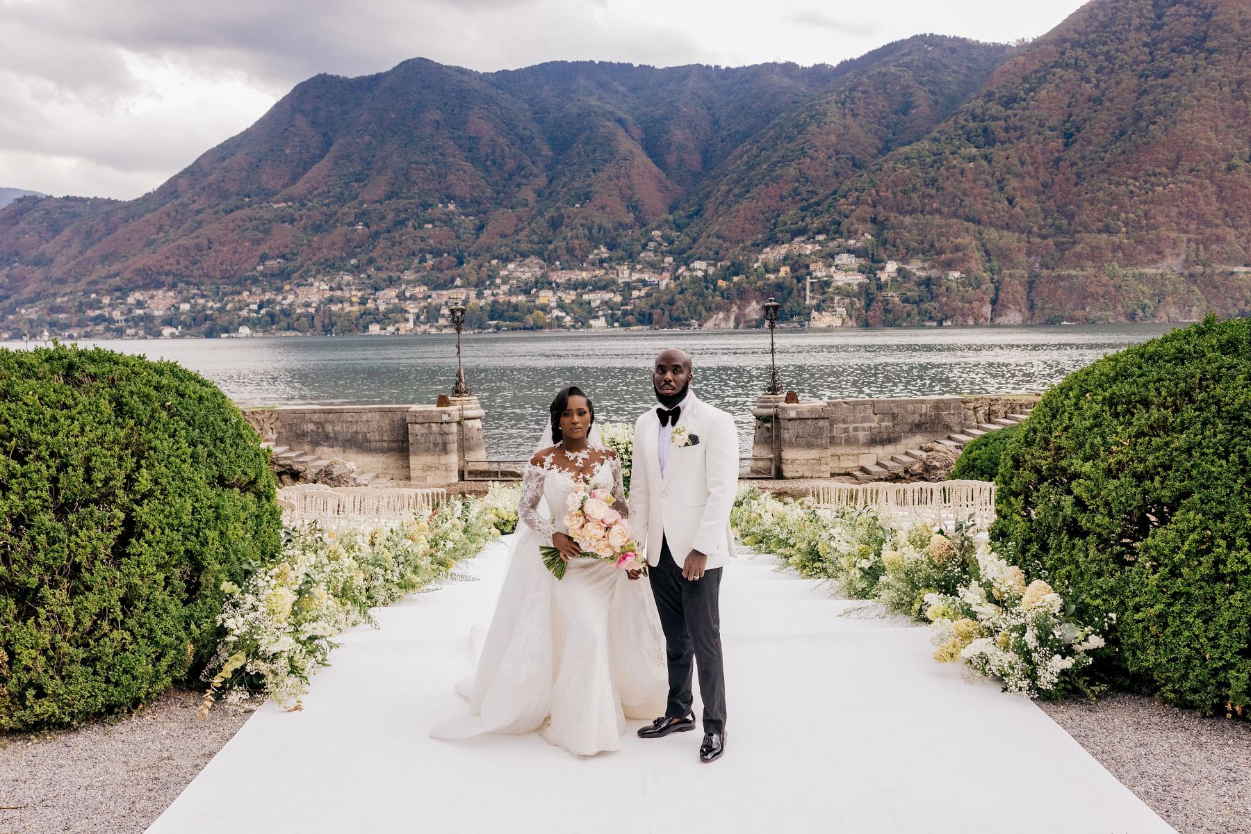 Blossoming Love by the Lake: Sade and Afam's Dreamy Celebration at Villa Erba and Villa Gastel photo