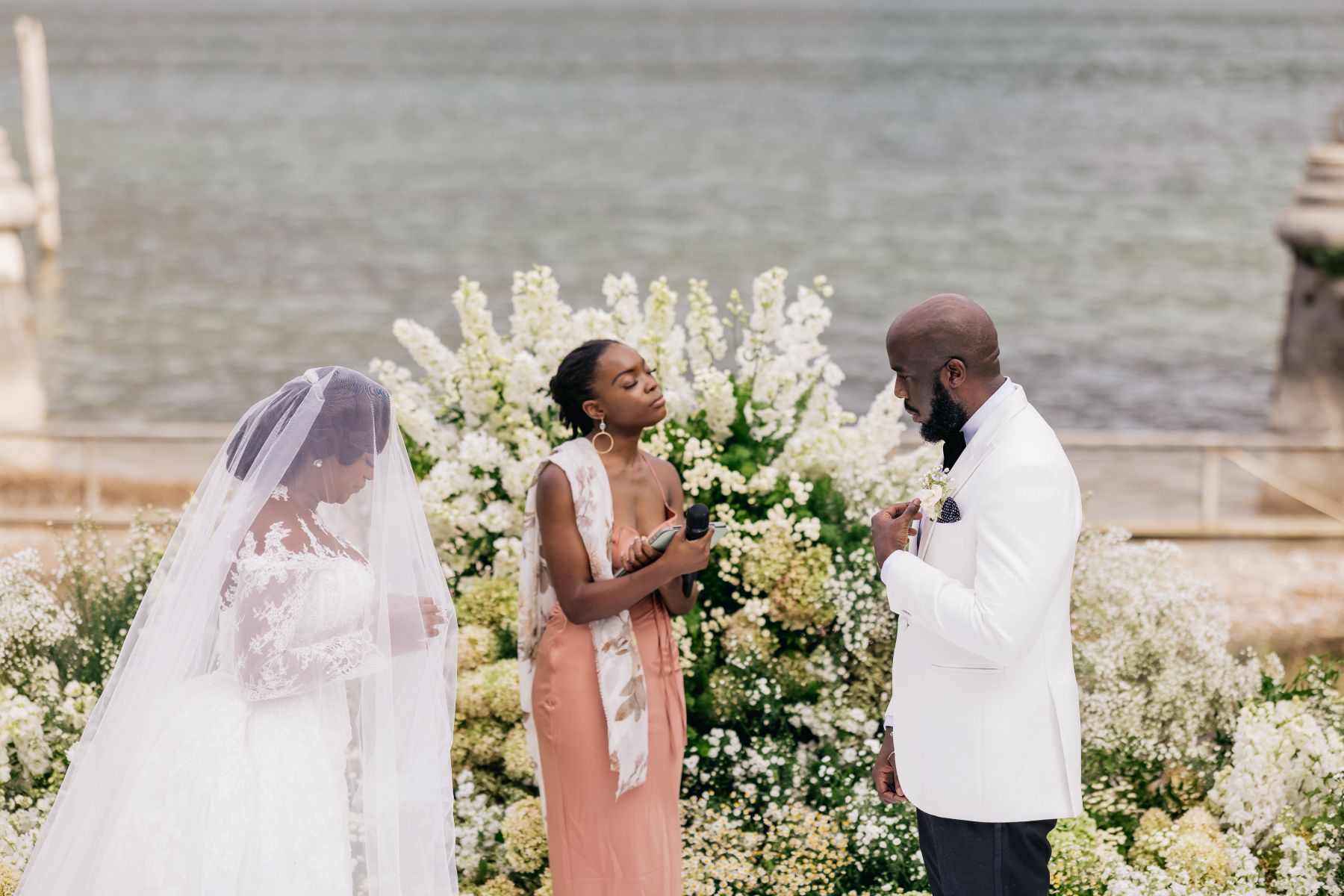 Blossoming Love by the Lake: Sade and Afam's Dreamy Celebration at Villa Erba and Villa Gastel photo