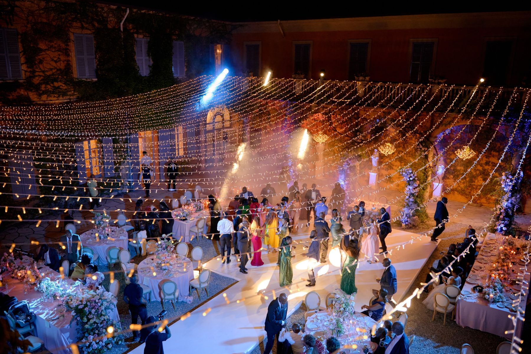 Blossoming Love by the Lake: Sade and Afam's Dreamy Celebration at Villa Erba and Villa Gastel photo