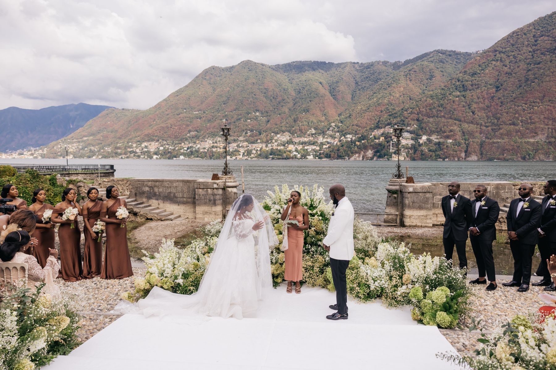 Blossoming Love by the Lake: Sade and Afam's Dreamy Celebration at Villa Erba and Villa Gastel photo