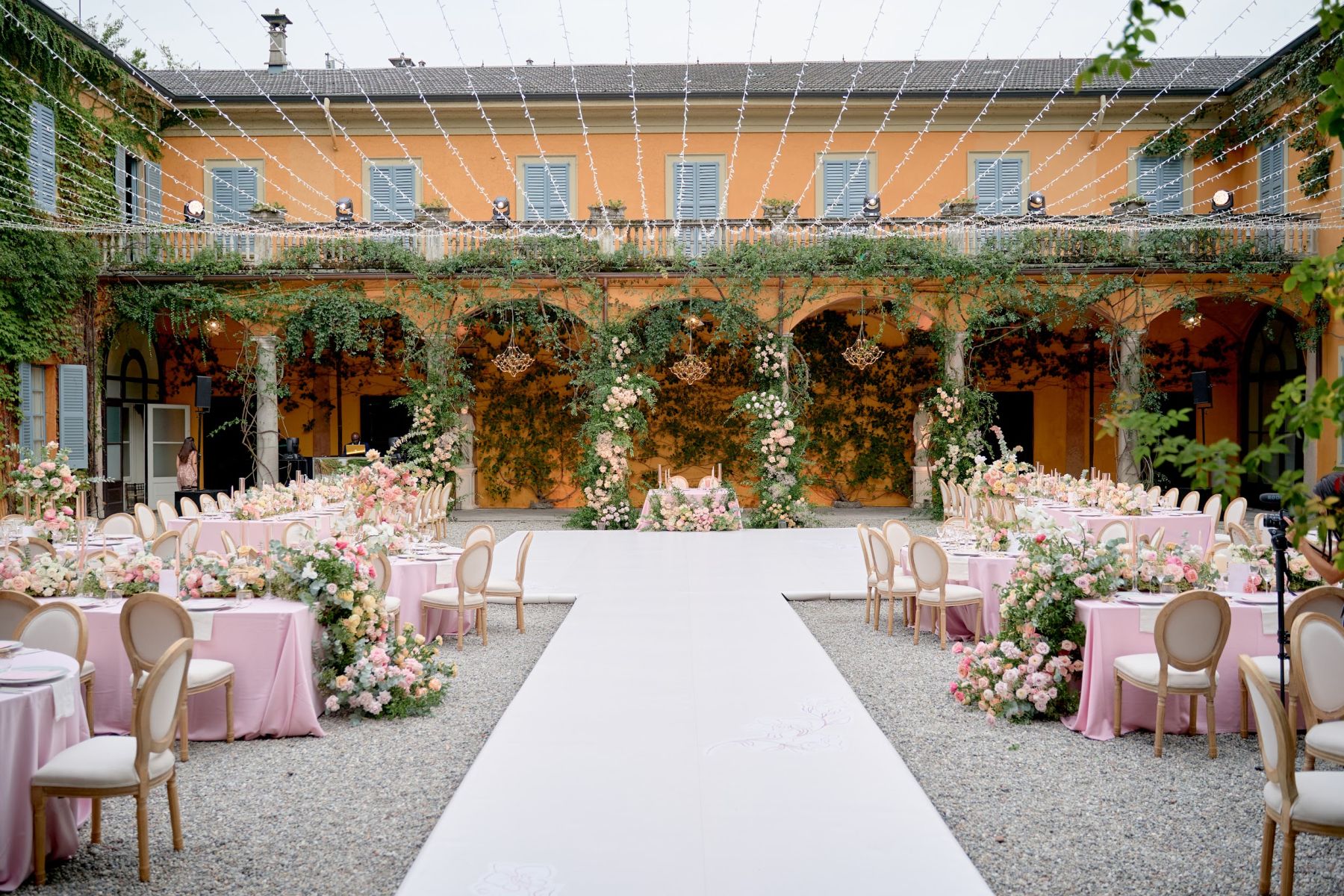 Blossoming Love by the Lake: Sade and Afam's Dreamy Celebration at Villa Erba and Villa Gastel photo
