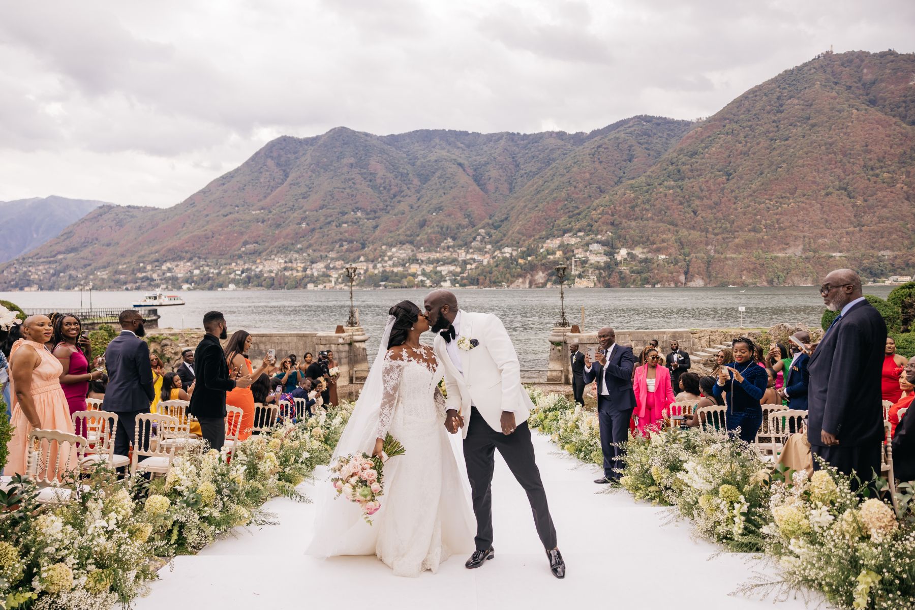 Blossoming Love by the Lake: Sade and Afam's Dreamy Celebration at Villa Erba and Villa Gastel photo