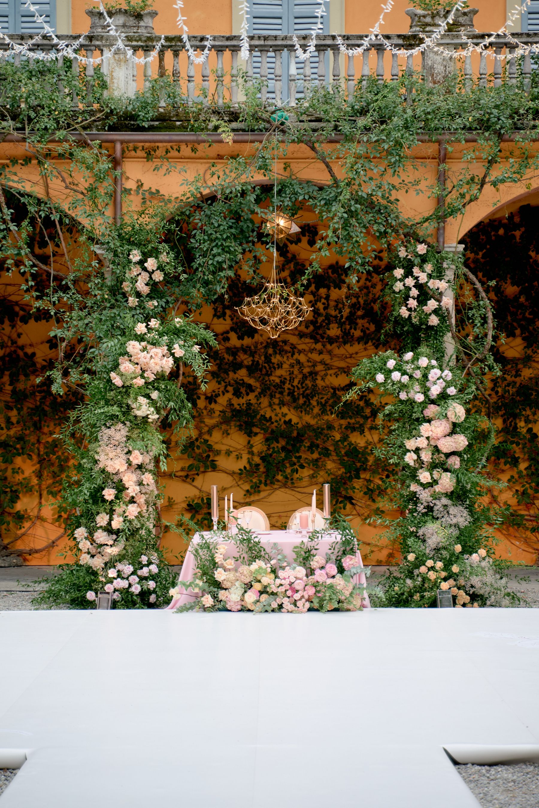 Blossoming Love by the Lake: Sade and Afam's Dreamy Celebration at Villa Erba and Villa Gastel photo