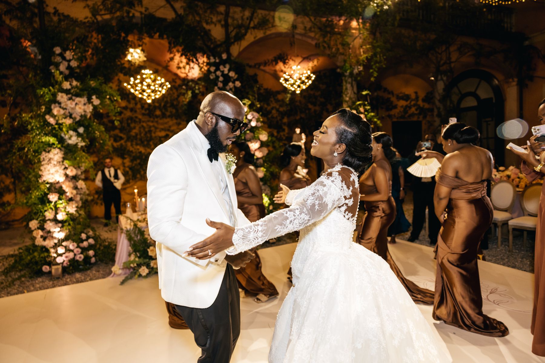 Blossoming Love by the Lake: Sade and Afam's Dreamy Celebration at Villa Erba and Villa Gastel photo