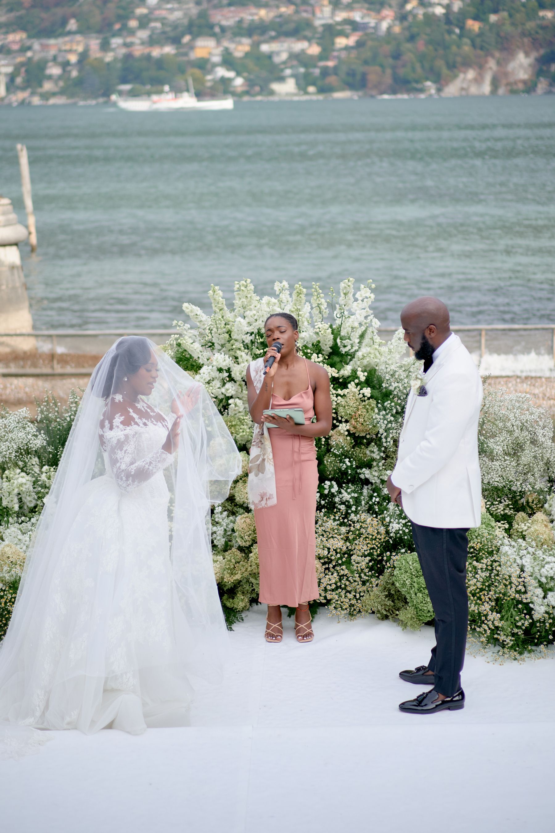 Blossoming Love by the Lake: Sade and Afam's Dreamy Celebration at Villa Erba and Villa Gastel photo
