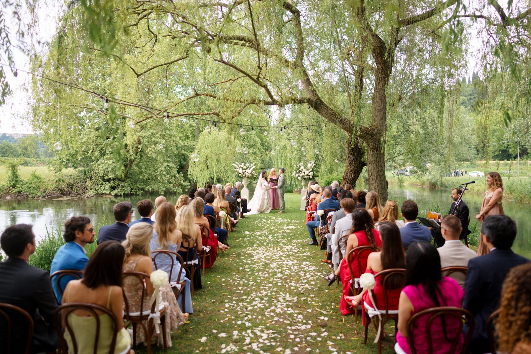 Dancing Through Time: Victoria and James' Magical Celebration at La Finestra Sul Fiume photo