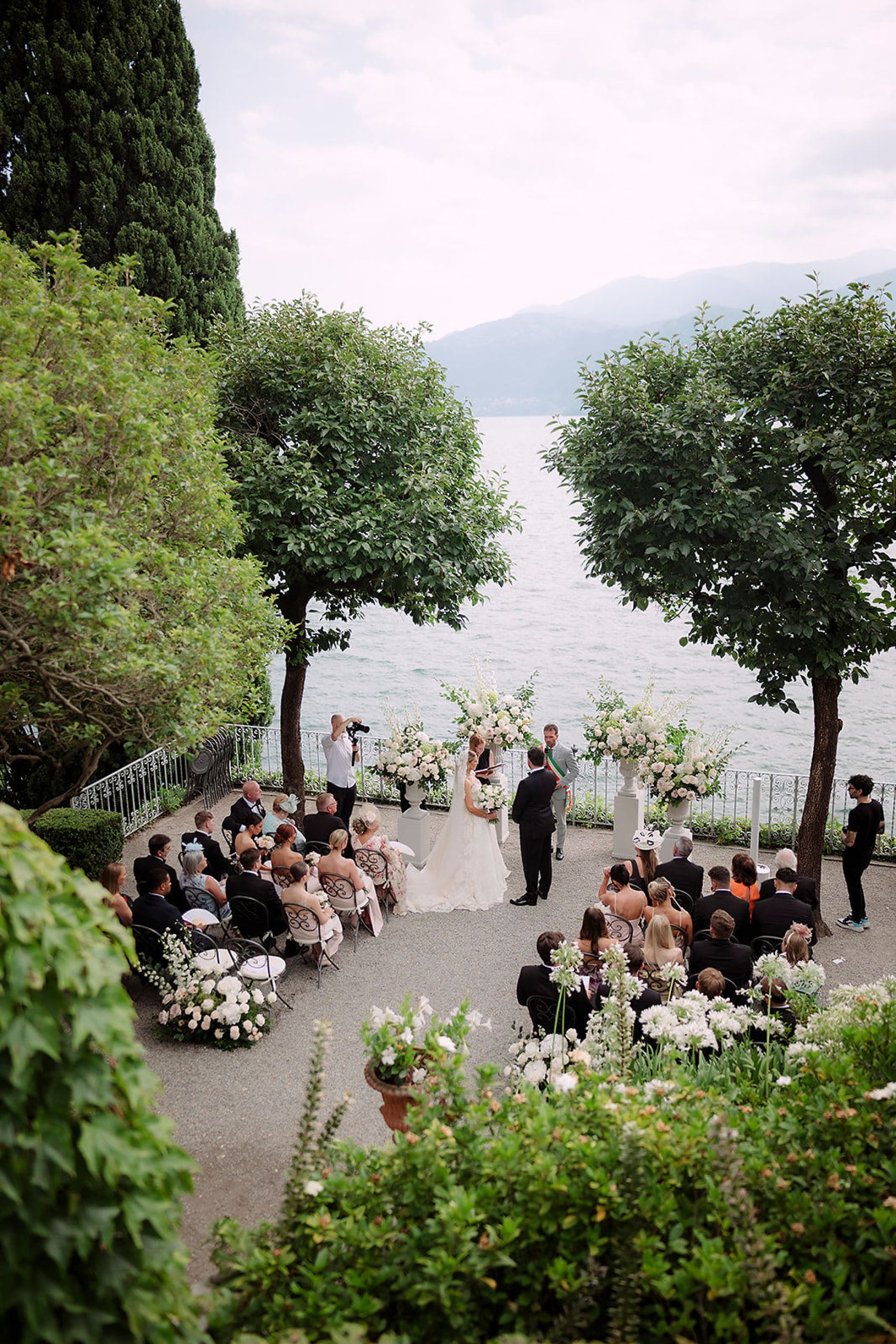 A Childhood Romance Blossoms in Lake Como: Lauren and Branagh's Timeless Wedding at Villa Cipressi photo