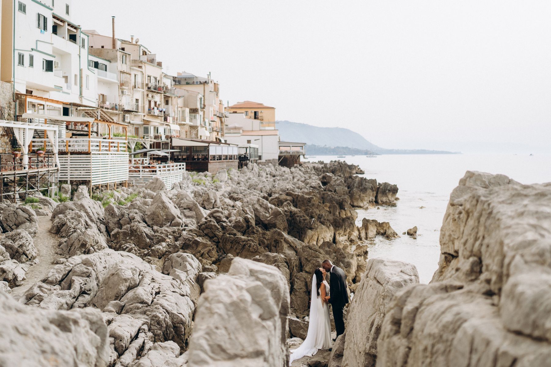 Romantic Seaside Celebration: Anna and Janny's Charming Wedding at Le Calette photo