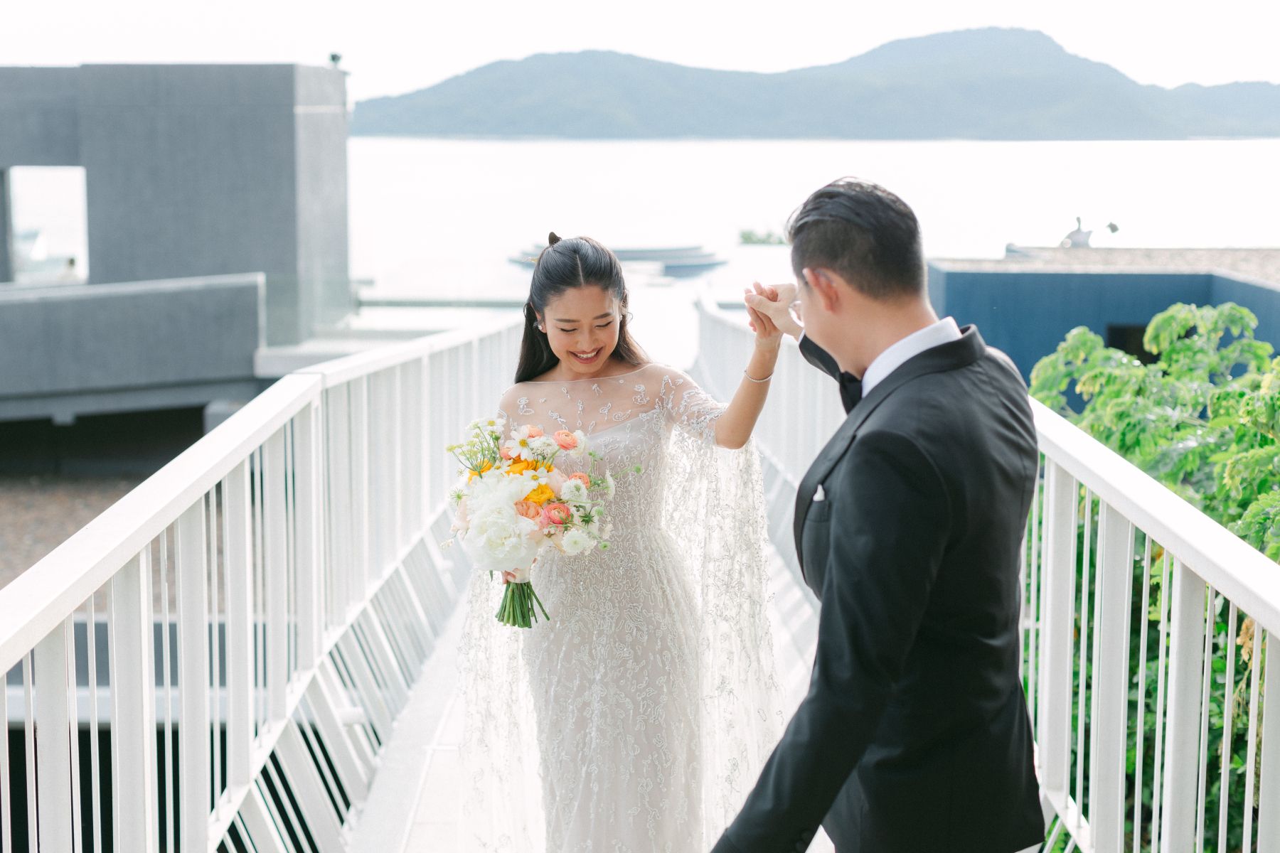 A Cross-Cultural Paradise Celebration: Khin Lay  &amp; Lucas's Romantic Wedding at Sri Panwa Phuket photo