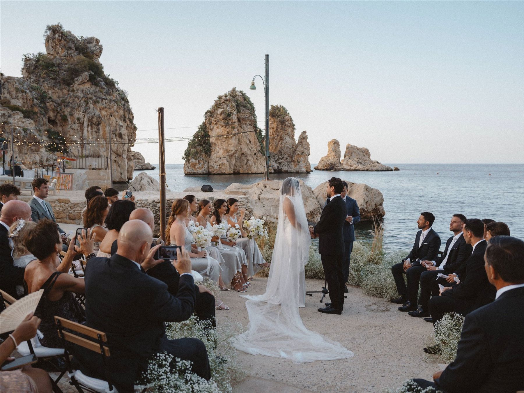 Love, Family, and the Perfect Sicilian Celebration: Markie &amp; Giuseppe’s Wedding at Tonnara di Scopello photo