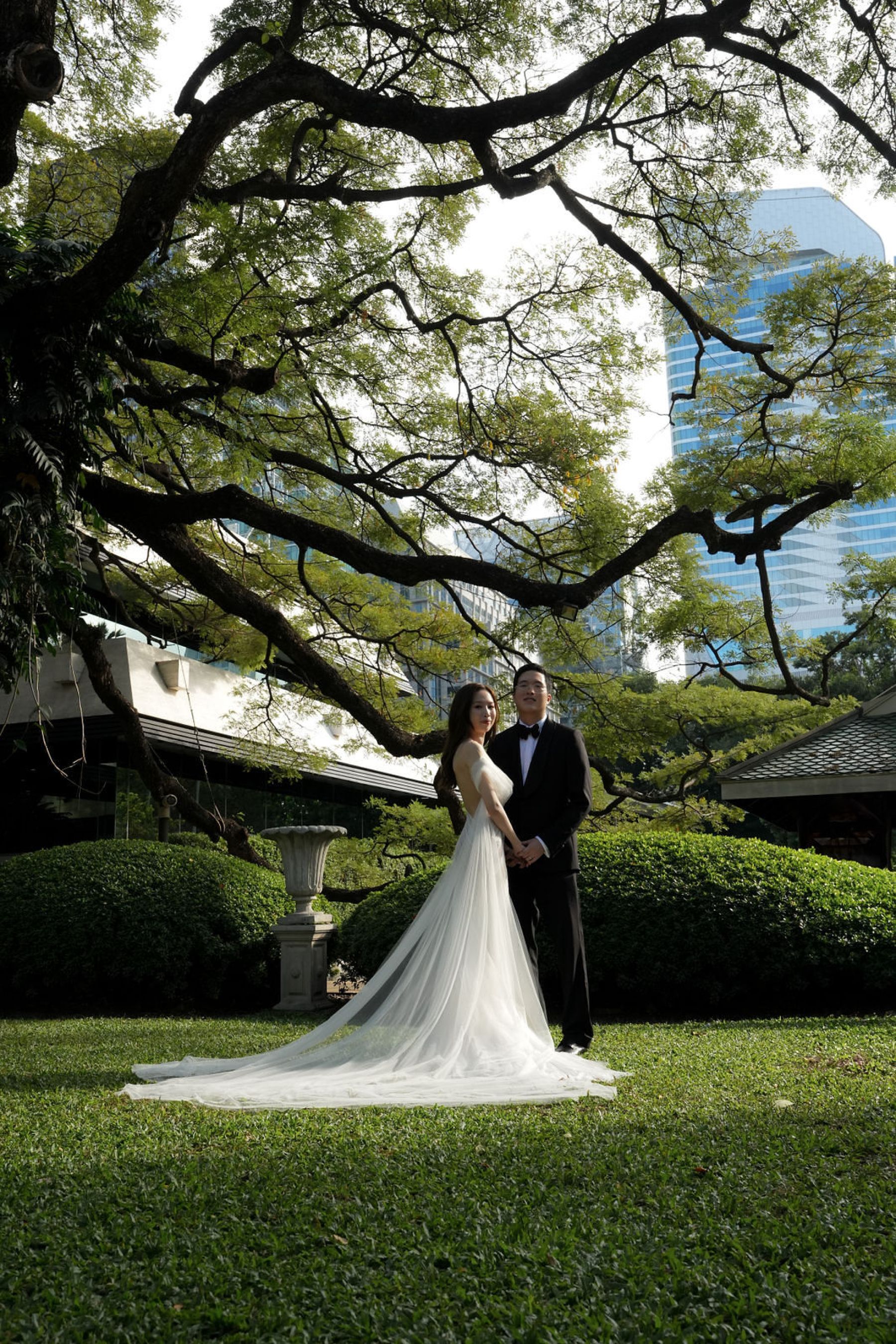 Under the Tree: Loreta and Thasit’s Enchanting Bangkok Wedding at Nai Lert Park photo