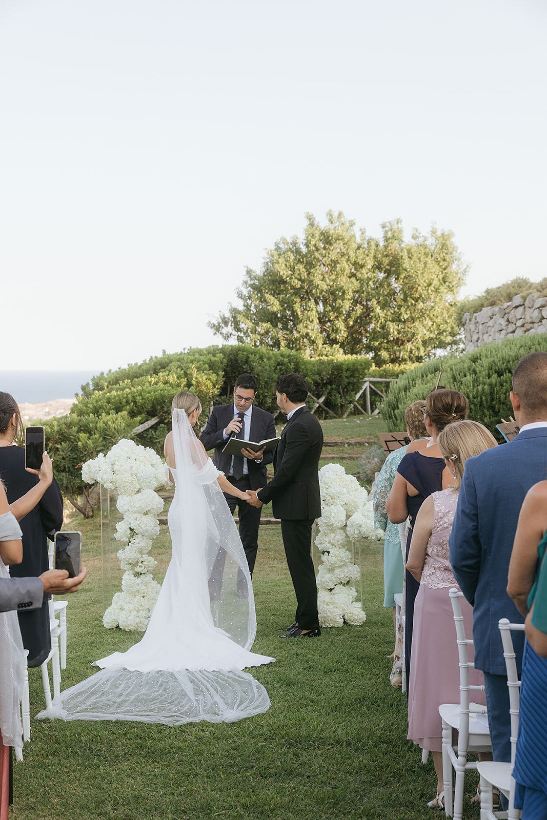 A Journey in Time and Love: Marlis-Madeleine &amp; Giancarlo’s Seaside Wedding at Tenuta Dalia photo