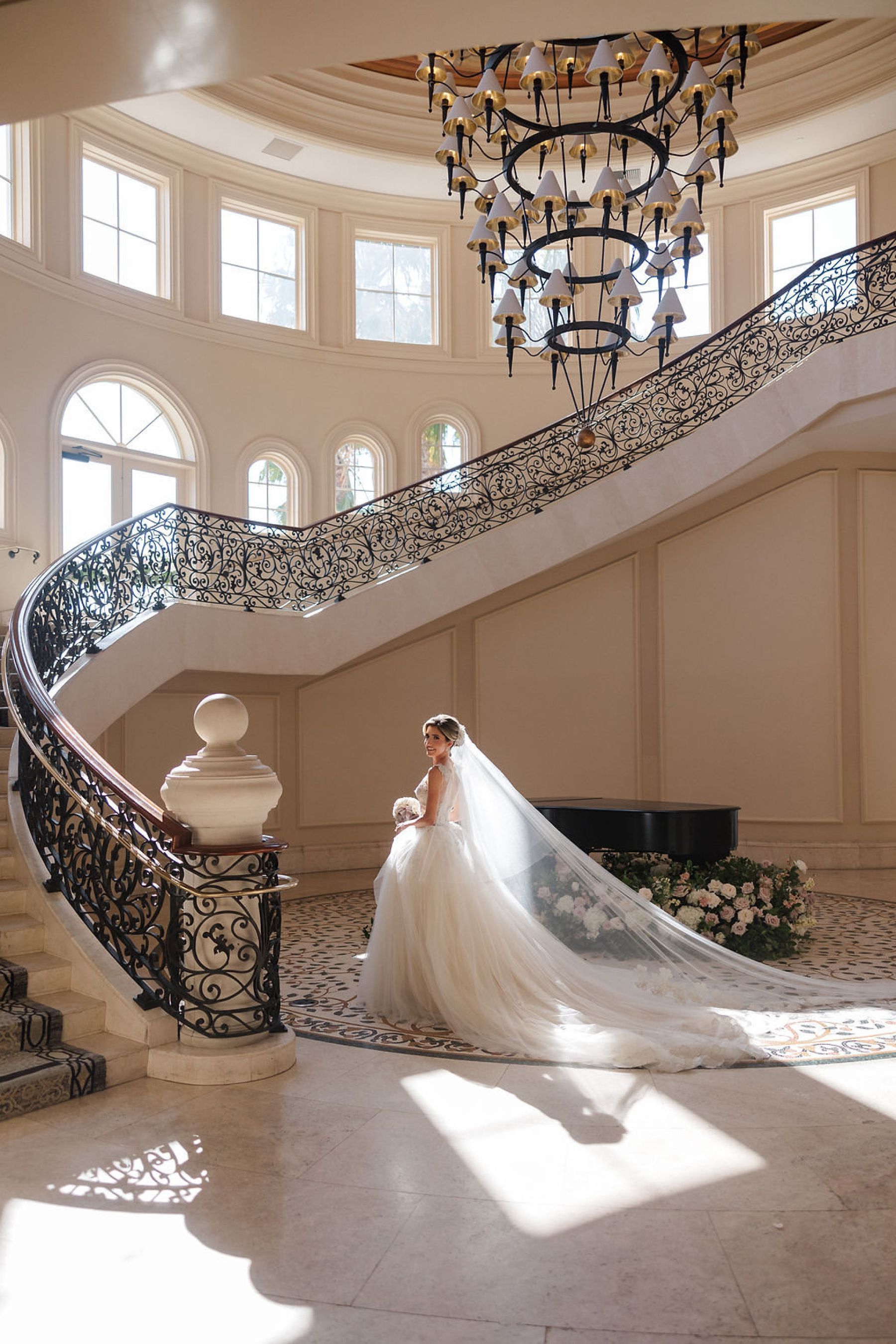 A Grand Staircase and a Love That Moved Mountains: Chanel &amp; Yannick’s Wedding at Waldorf Astoria Monarch Beach Resort photo