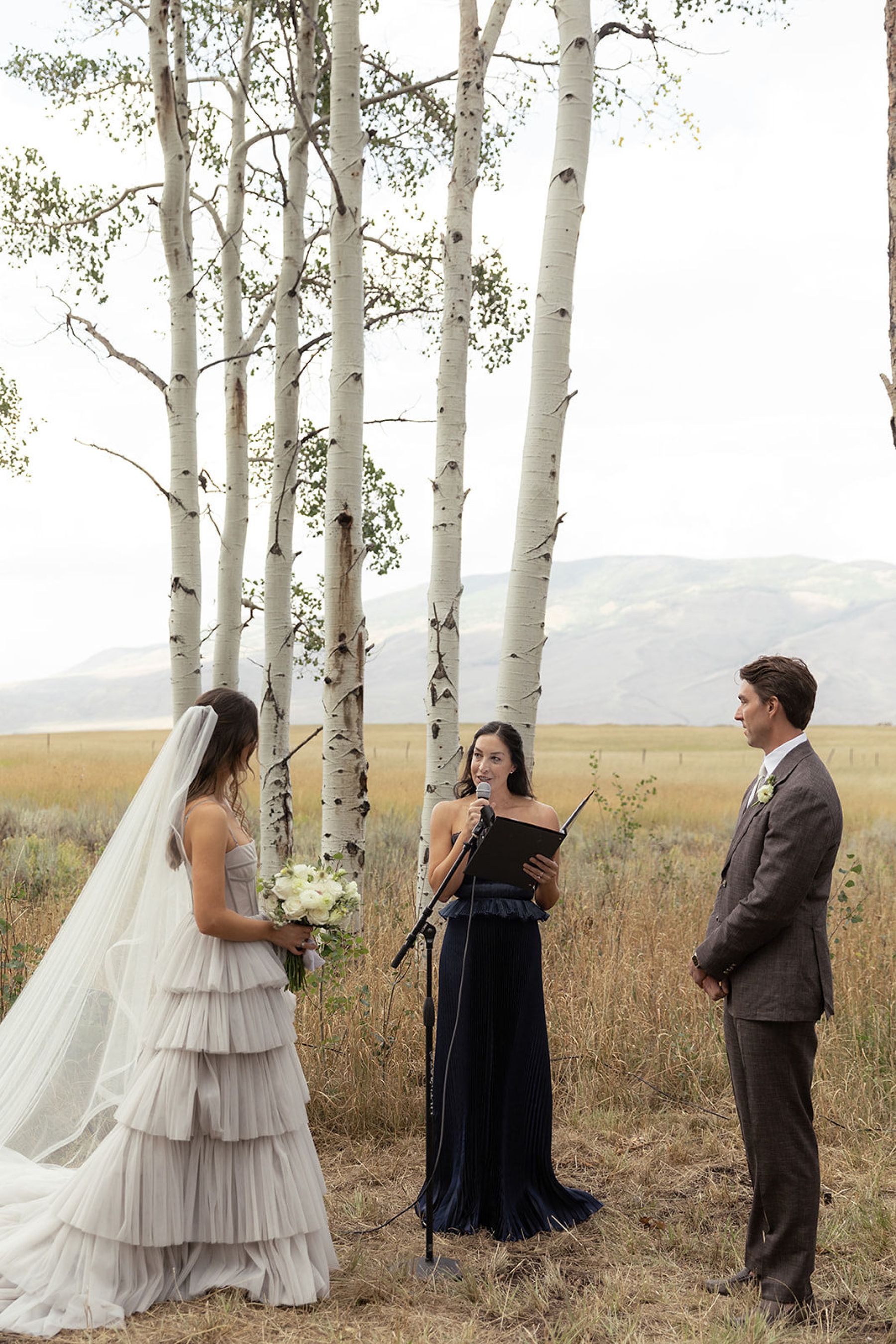 A Laugh-Cry Down the Aisle and Dinner Beneath the Aspens: Olivia &amp; Zach's Wedding at Their Family Property in Silverthorne photo