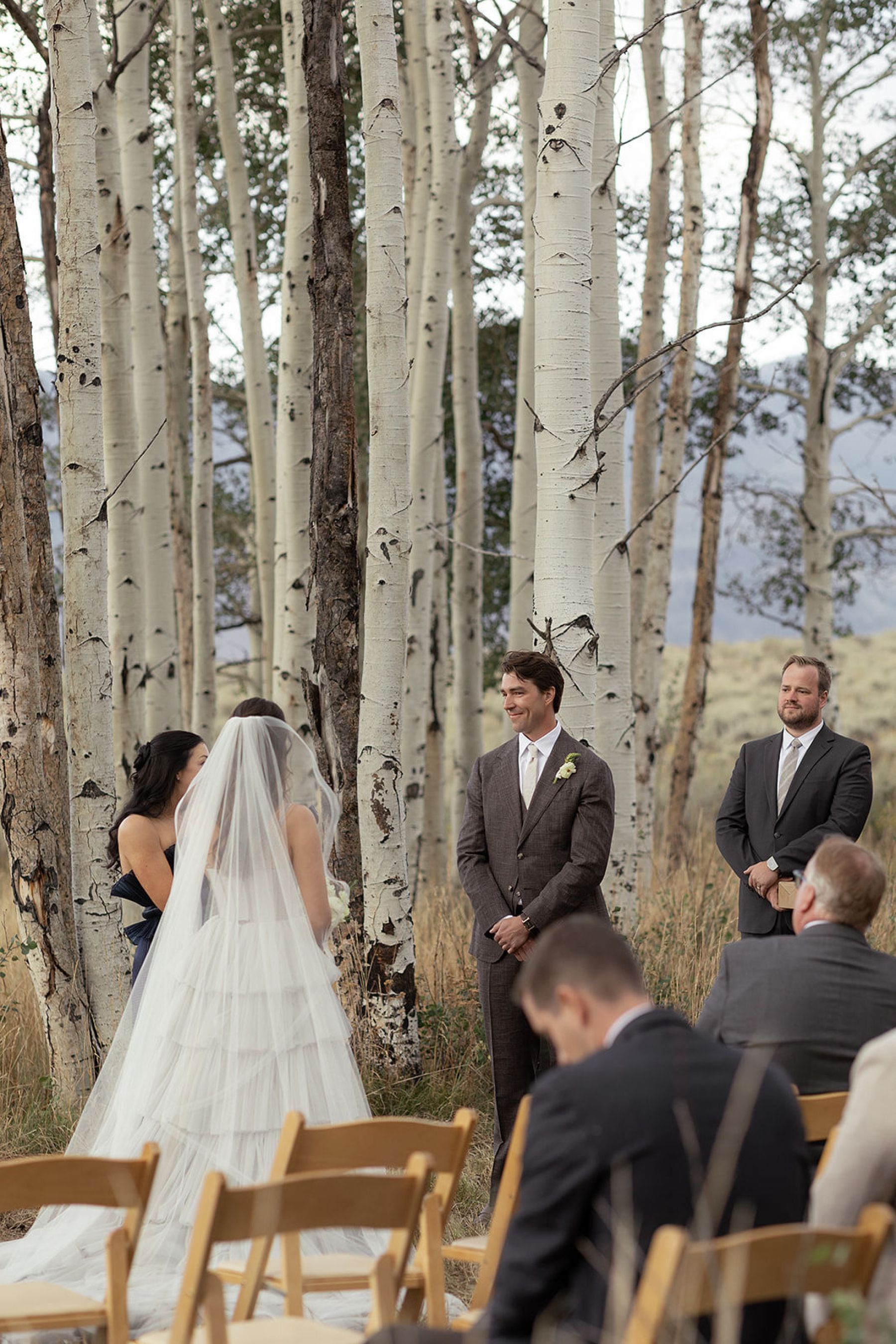 A Laugh-Cry Down the Aisle and Dinner Beneath the Aspens: Olivia &amp; Zach's Wedding at Their Family Property in Silverthorne photo