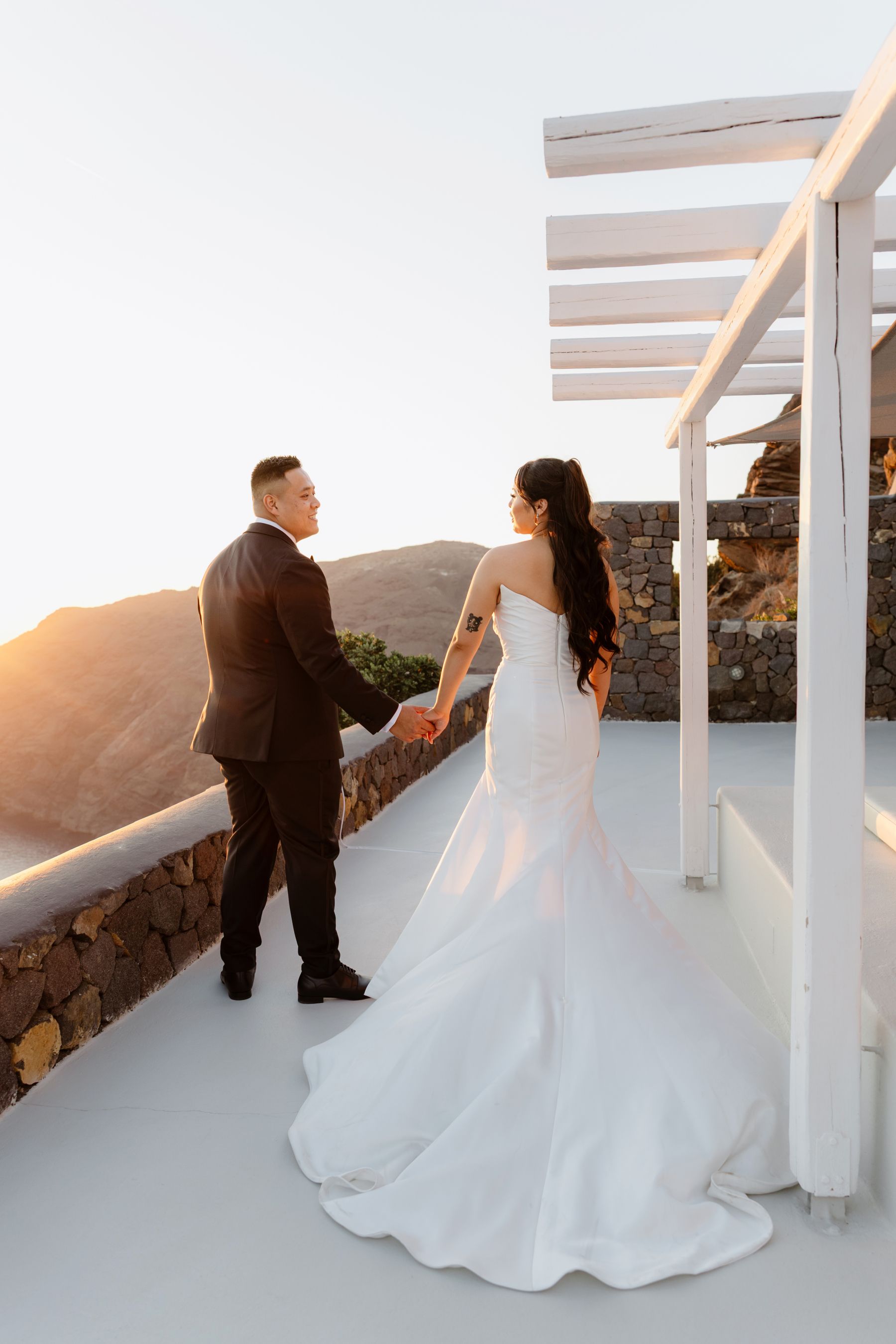“Fourteen Years Later, He Reminds Me It Was Love at First Sight”: Janet &amp; Anthony’s Wedding at Aenaon Villas, Santorini photo