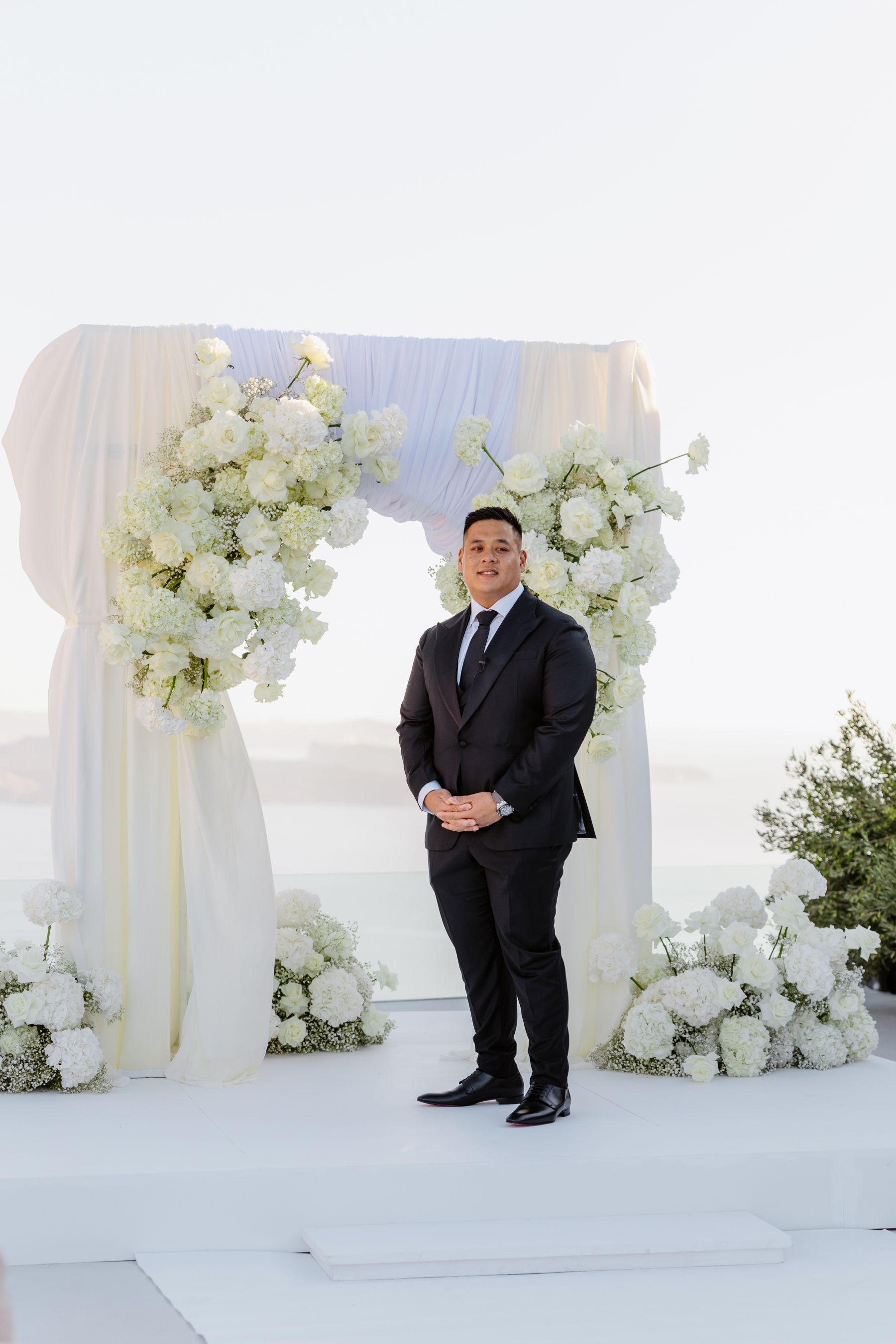“Fourteen Years Later, He Reminds Me It Was Love at First Sight”: Janet &amp; Anthony’s Wedding at Aenaon Villas, Santorini photo
