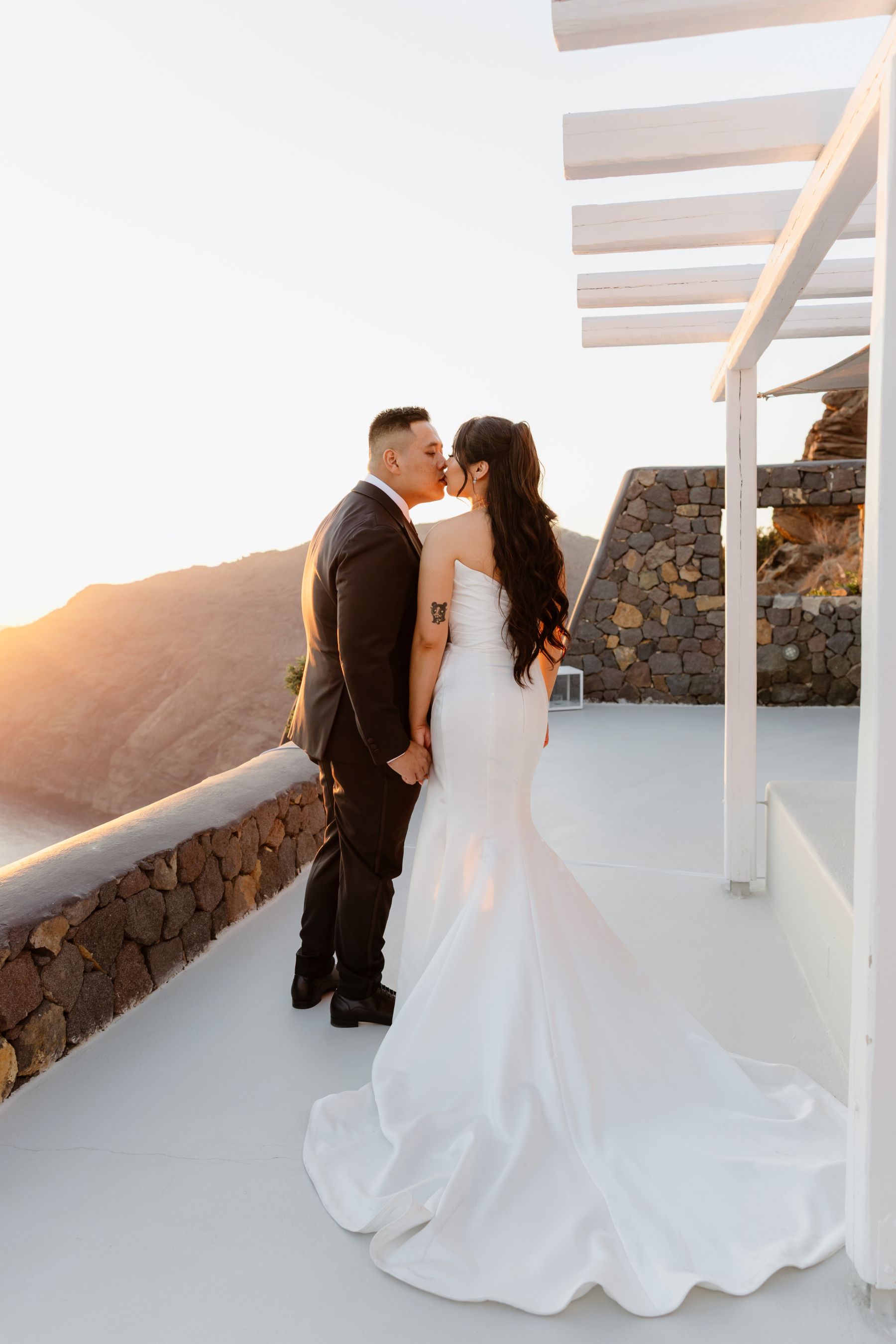 “Fourteen Years Later, He Reminds Me It Was Love at First Sight”: Janet &amp; Anthony’s Wedding at Aenaon Villas, Santorini photo