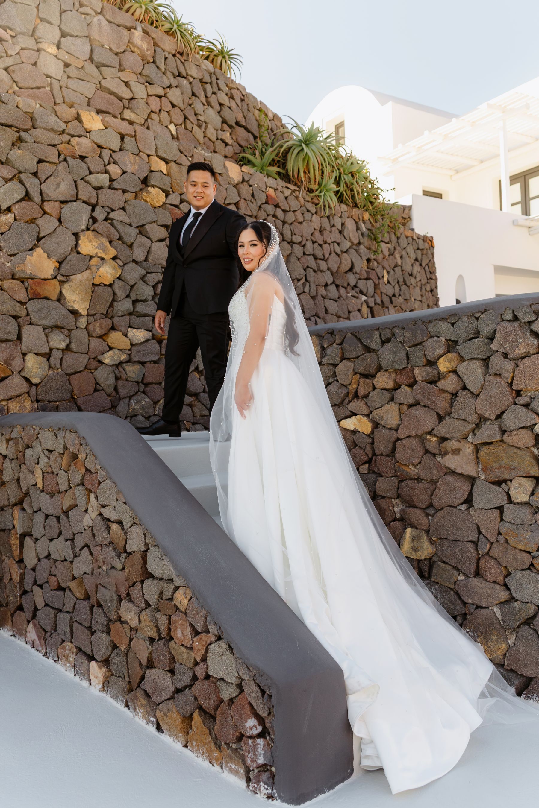 “Fourteen Years Later, He Reminds Me It Was Love at First Sight”: Janet &amp; Anthony’s Wedding at Aenaon Villas, Santorini photo