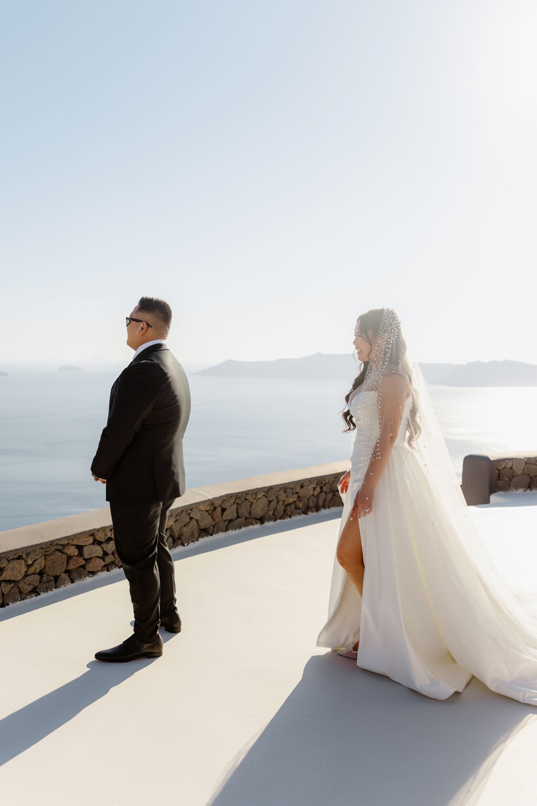 “Fourteen Years Later, He Reminds Me It Was Love at First Sight”: Janet &amp; Anthony’s Wedding at Aenaon Villas, Santorini photo