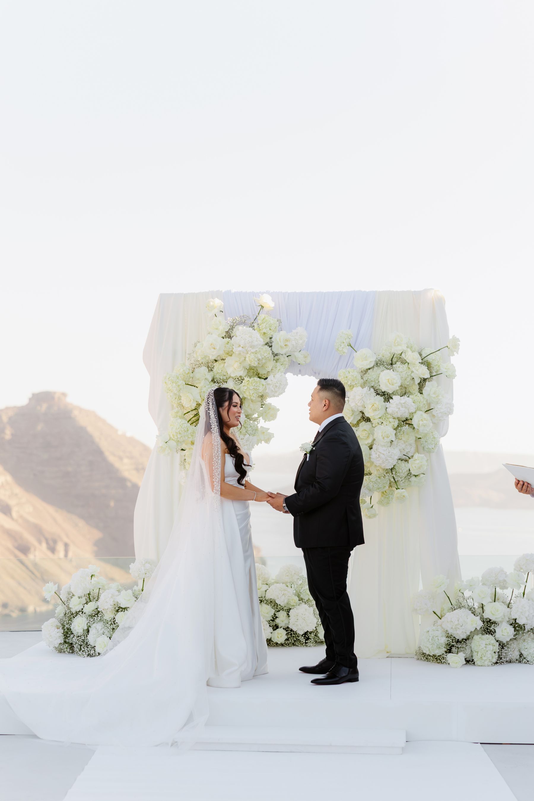 “Fourteen Years Later, He Reminds Me It Was Love at First Sight”: Janet &amp; Anthony’s Wedding at Aenaon Villas, Santorini photo