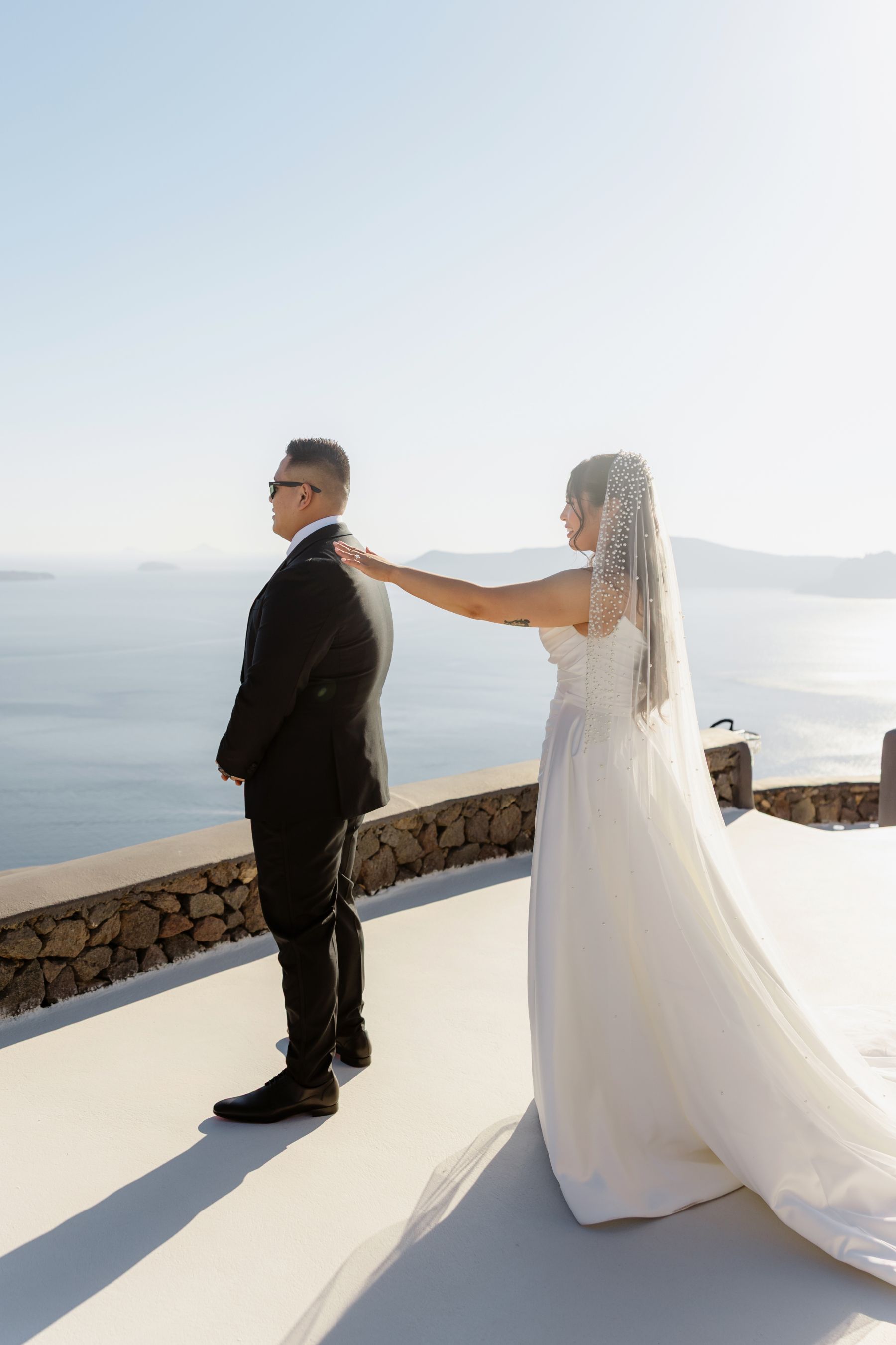 “Fourteen Years Later, He Reminds Me It Was Love at First Sight”: Janet &amp; Anthony’s Wedding at Aenaon Villas, Santorini photo