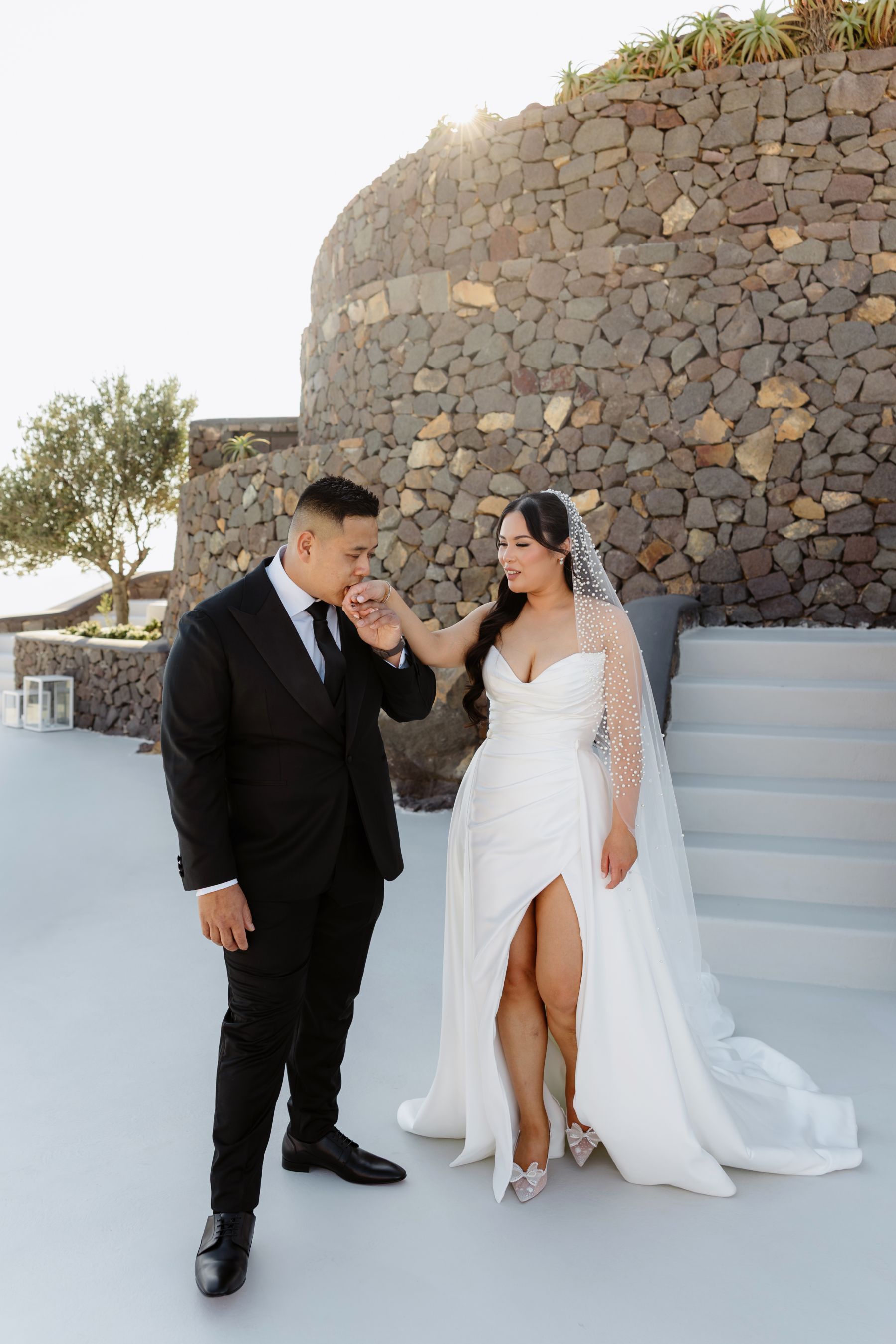 “Fourteen Years Later, He Reminds Me It Was Love at First Sight”: Janet &amp; Anthony’s Wedding at Aenaon Villas, Santorini photo