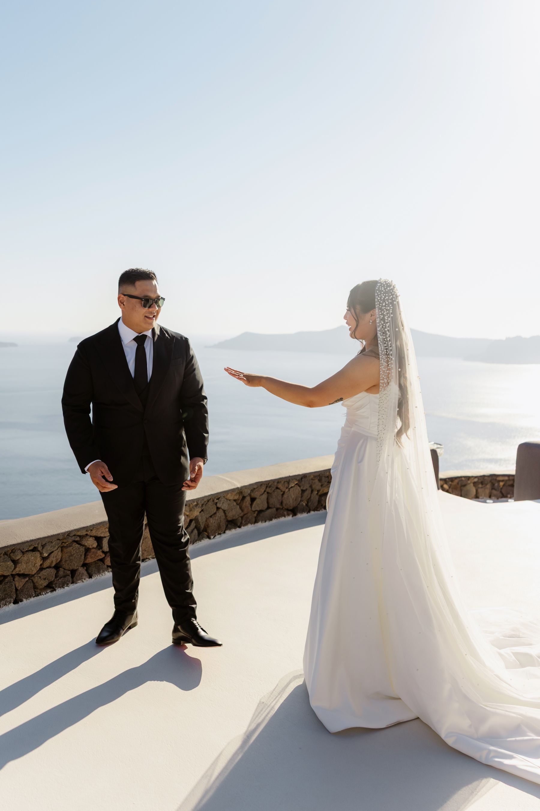 “Fourteen Years Later, He Reminds Me It Was Love at First Sight”: Janet &amp; Anthony’s Wedding at Aenaon Villas, Santorini photo