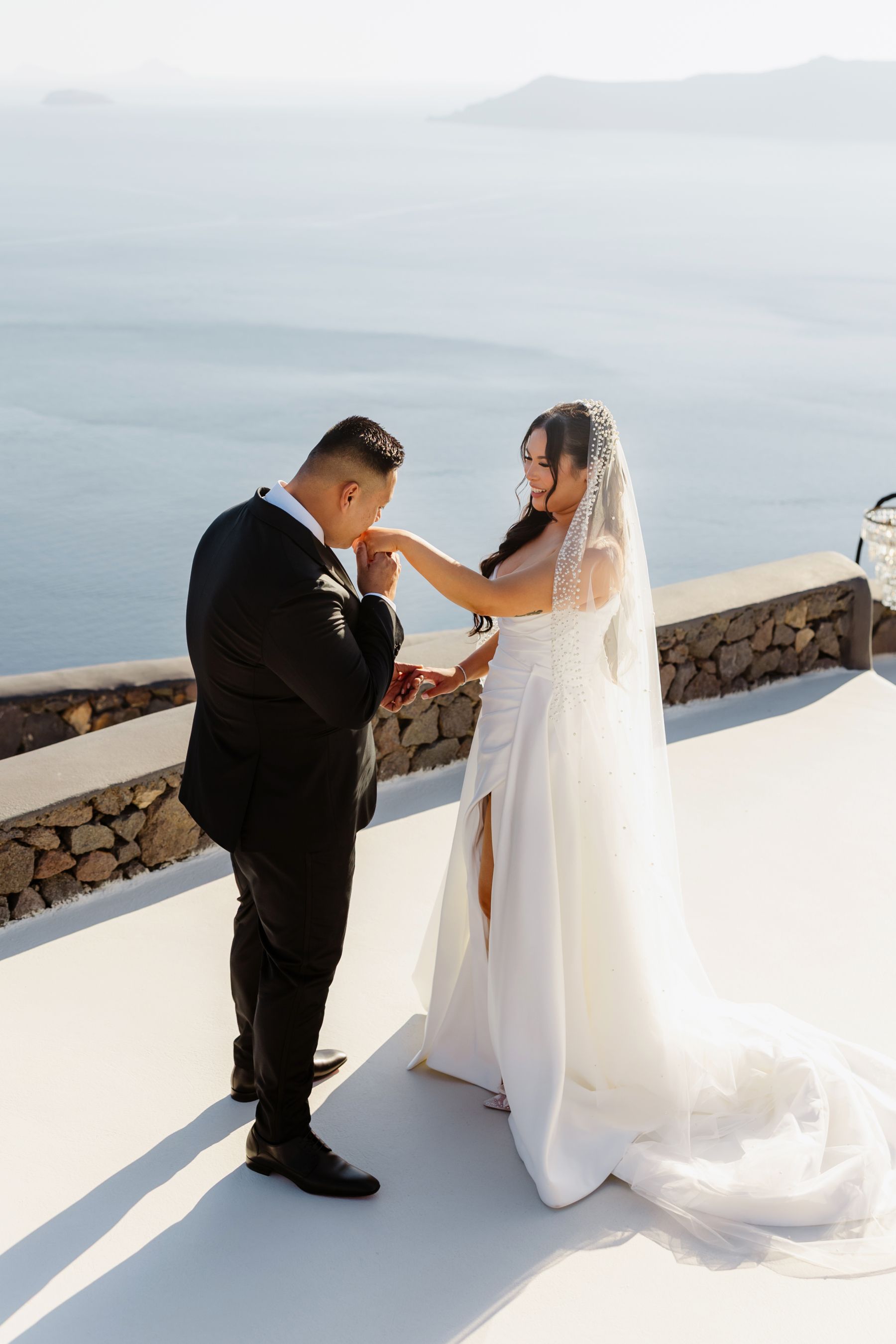 “Fourteen Years Later, He Reminds Me It Was Love at First Sight”: Janet &amp; Anthony’s Wedding at Aenaon Villas, Santorini photo