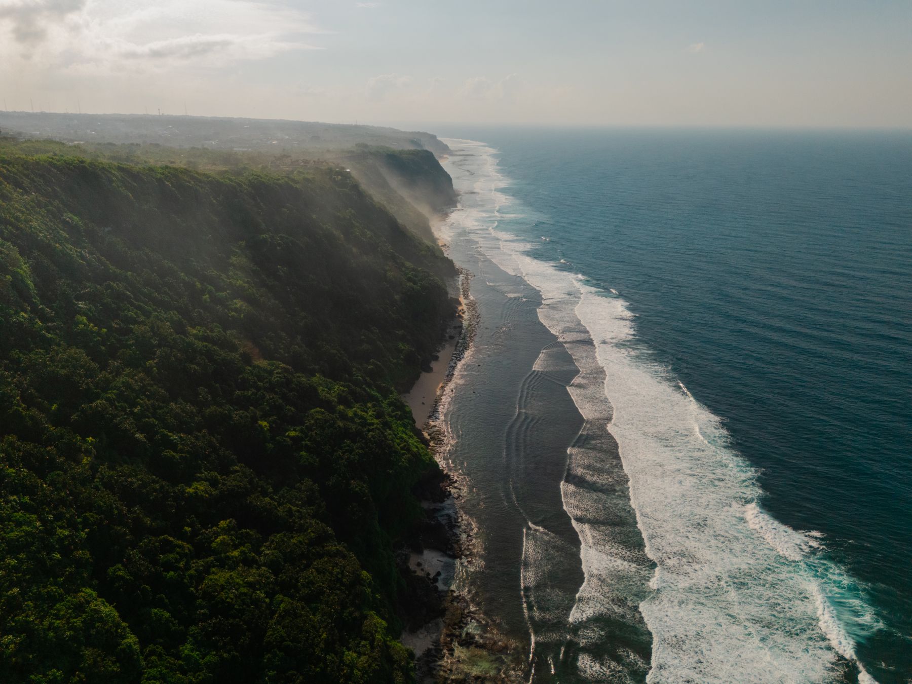 A Mirrored Aisle and a Bali Sky: Nouva &amp; Hary's Wedding at Six Senses Uluwatu photo