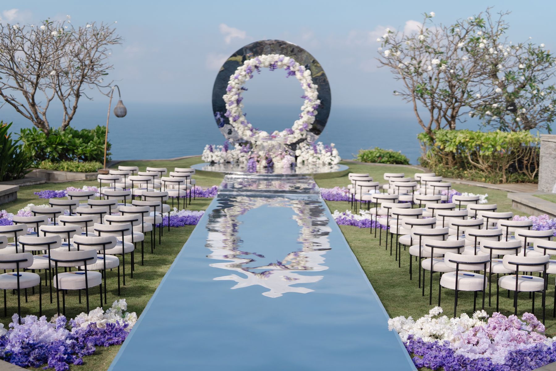 A Mirrored Aisle and a Bali Sky: Nouva &amp; Hary's Wedding at Six Senses Uluwatu photo
