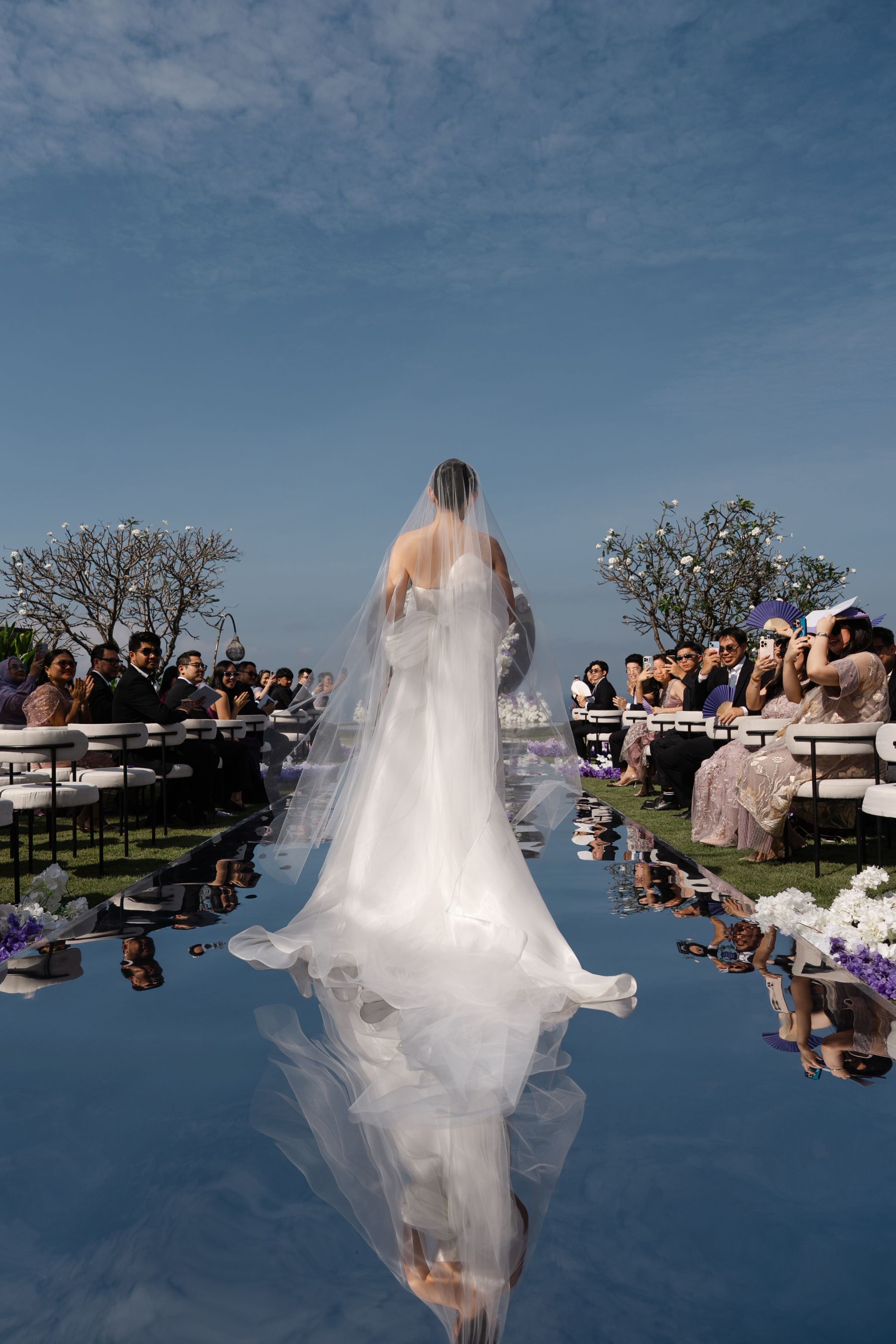 A Mirrored Aisle and a Bali Sky: Nouva &amp; Hary's Wedding at Six Senses Uluwatu photo