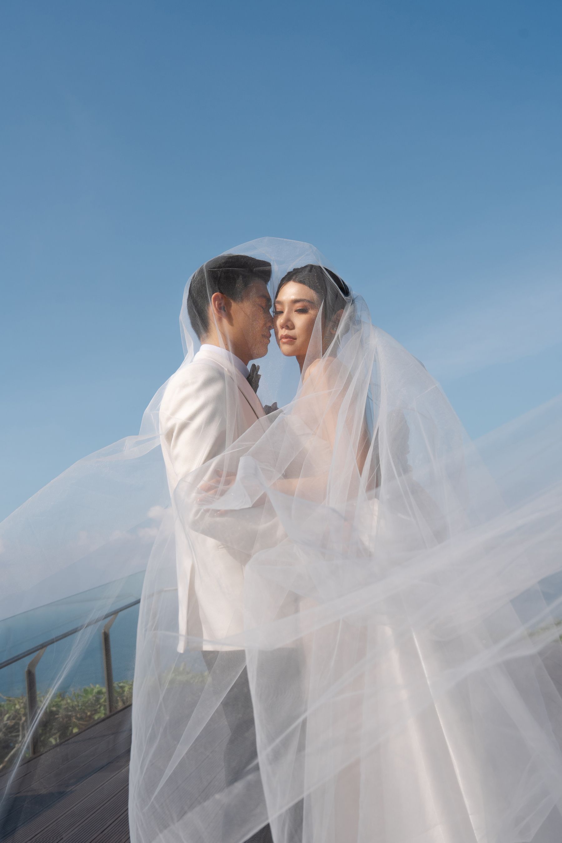 A Mirrored Aisle and a Bali Sky: Nouva &amp; Hary's Wedding at Six Senses Uluwatu photo