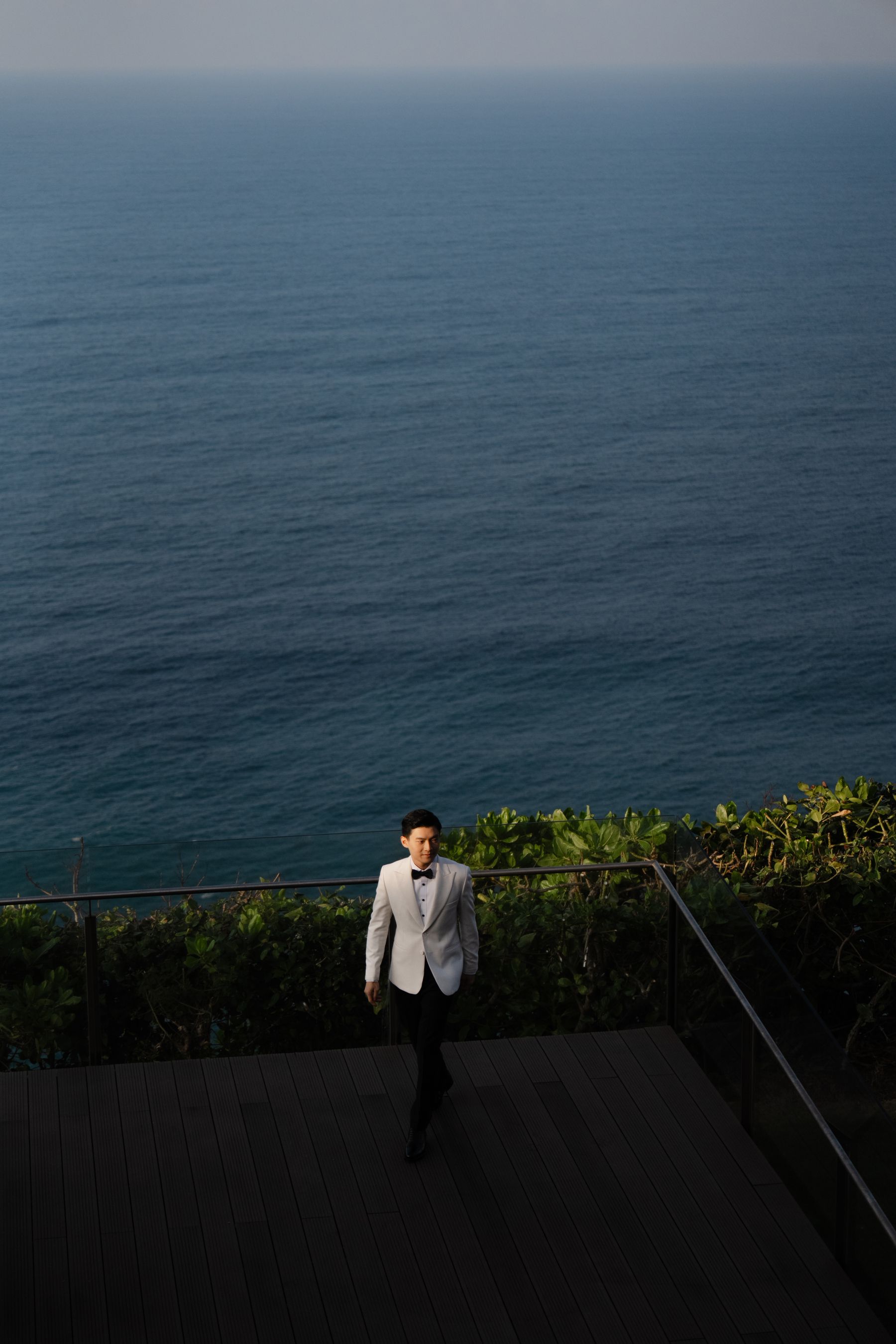 A Mirrored Aisle and a Bali Sky: Nouva &amp; Hary's Wedding at Six Senses Uluwatu photo