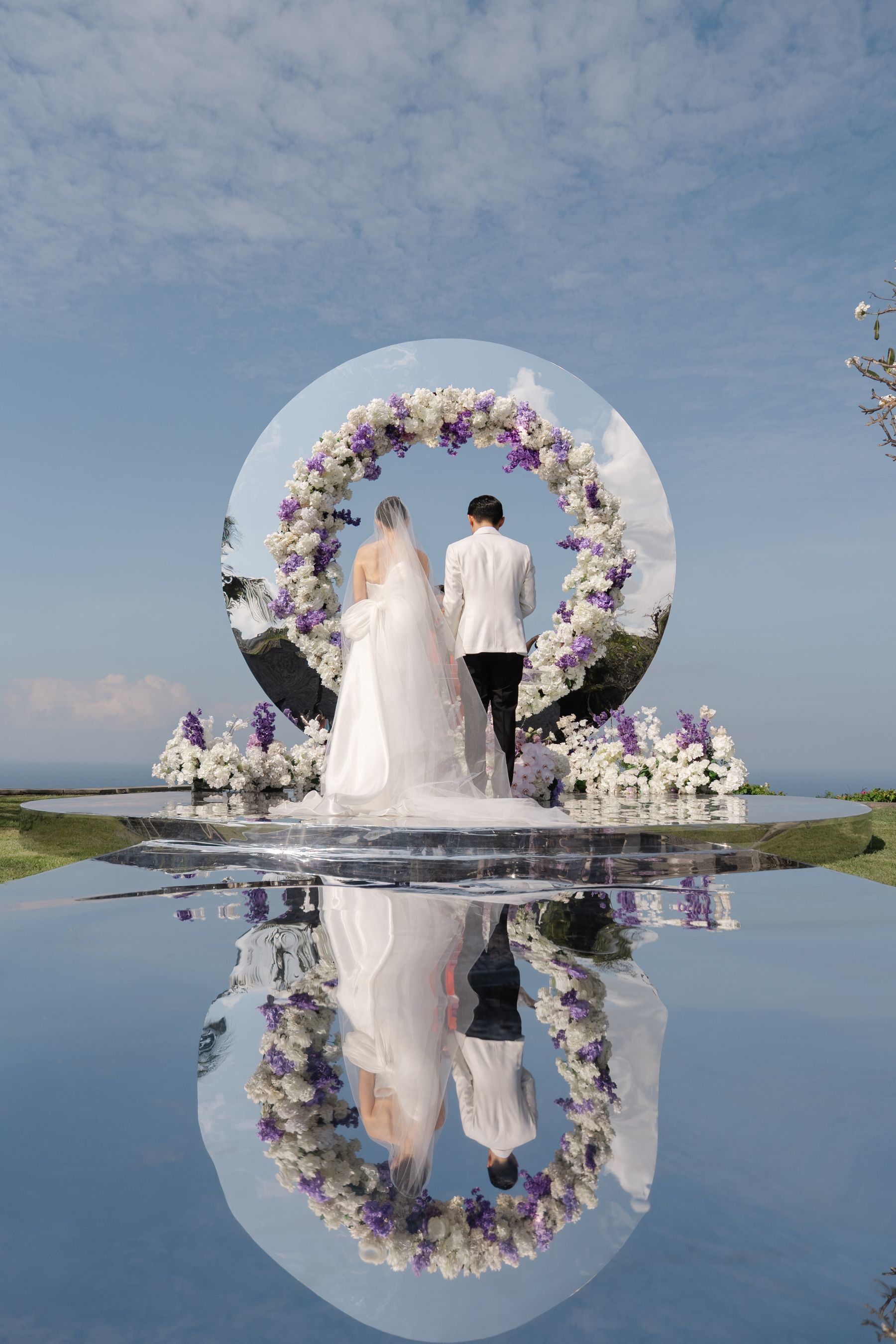 A Mirrored Aisle and a Bali Sky: Nouva &amp; Hary's Wedding at Six Senses Uluwatu photo