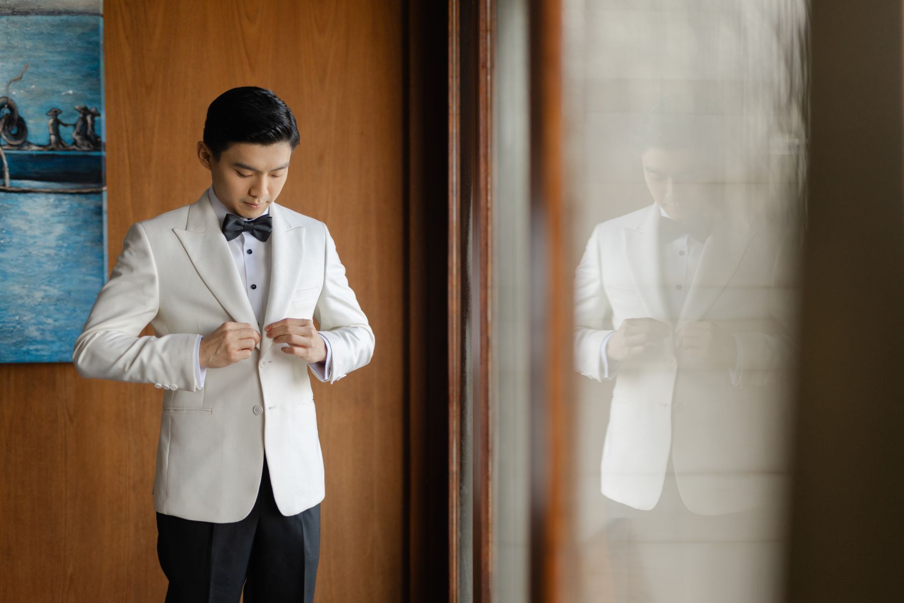 A Mirrored Aisle and a Bali Sky: Nouva &amp; Hary's Wedding at Six Senses Uluwatu photo