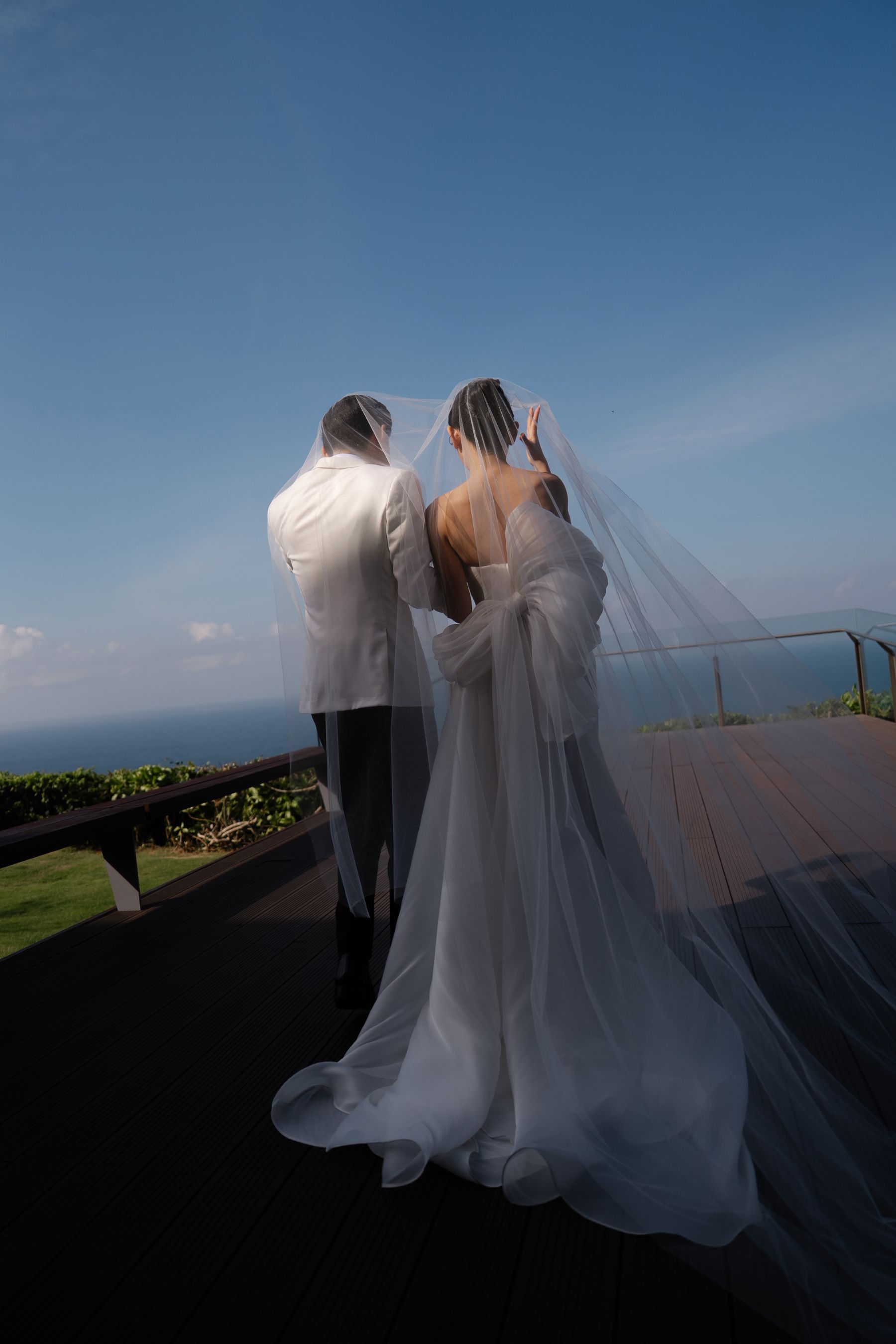 A Mirrored Aisle and a Bali Sky: Nouva &amp; Hary's Wedding at Six Senses Uluwatu photo